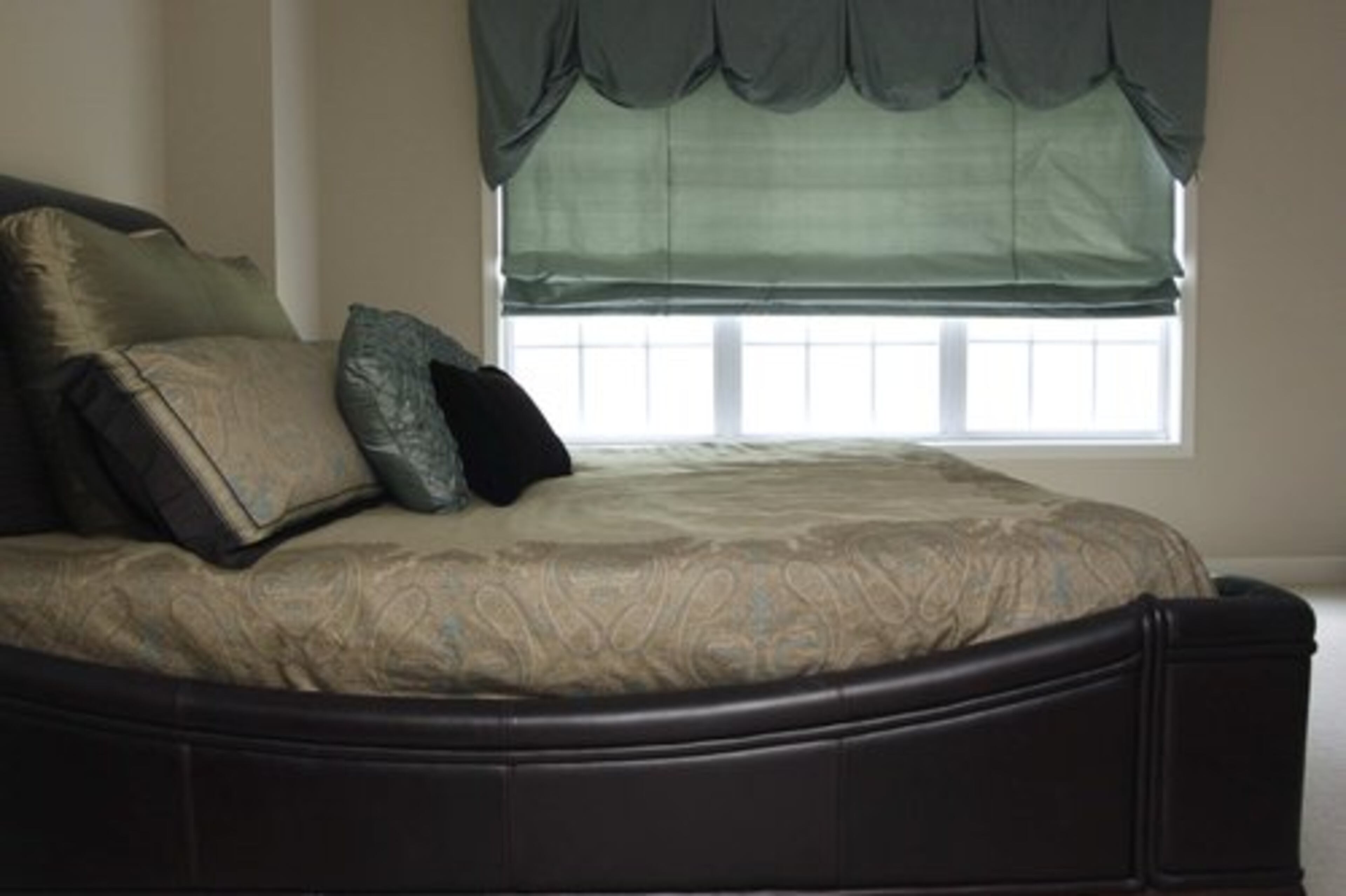 Thompkins puts her leather king-size sleigh bed at the top of her favorite things list.