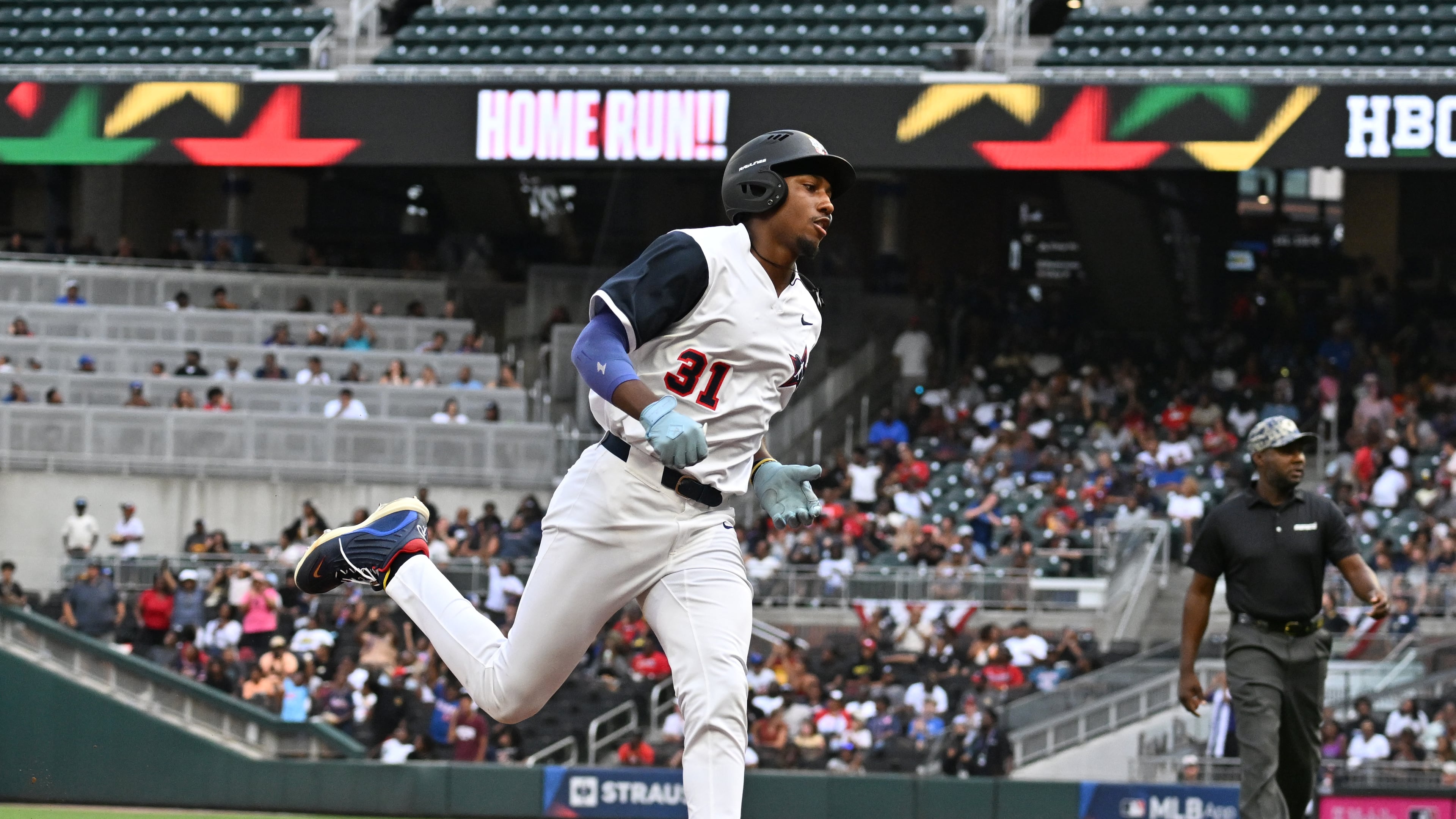 National League outfielder Kameron Douglas of Alabama State University (31) hits a solo homer during the second inning of HBCU Swingman Classic at Truist Park, Friday, July 11, 2025, in Atlanta. (Hyosub Shin / AJC)