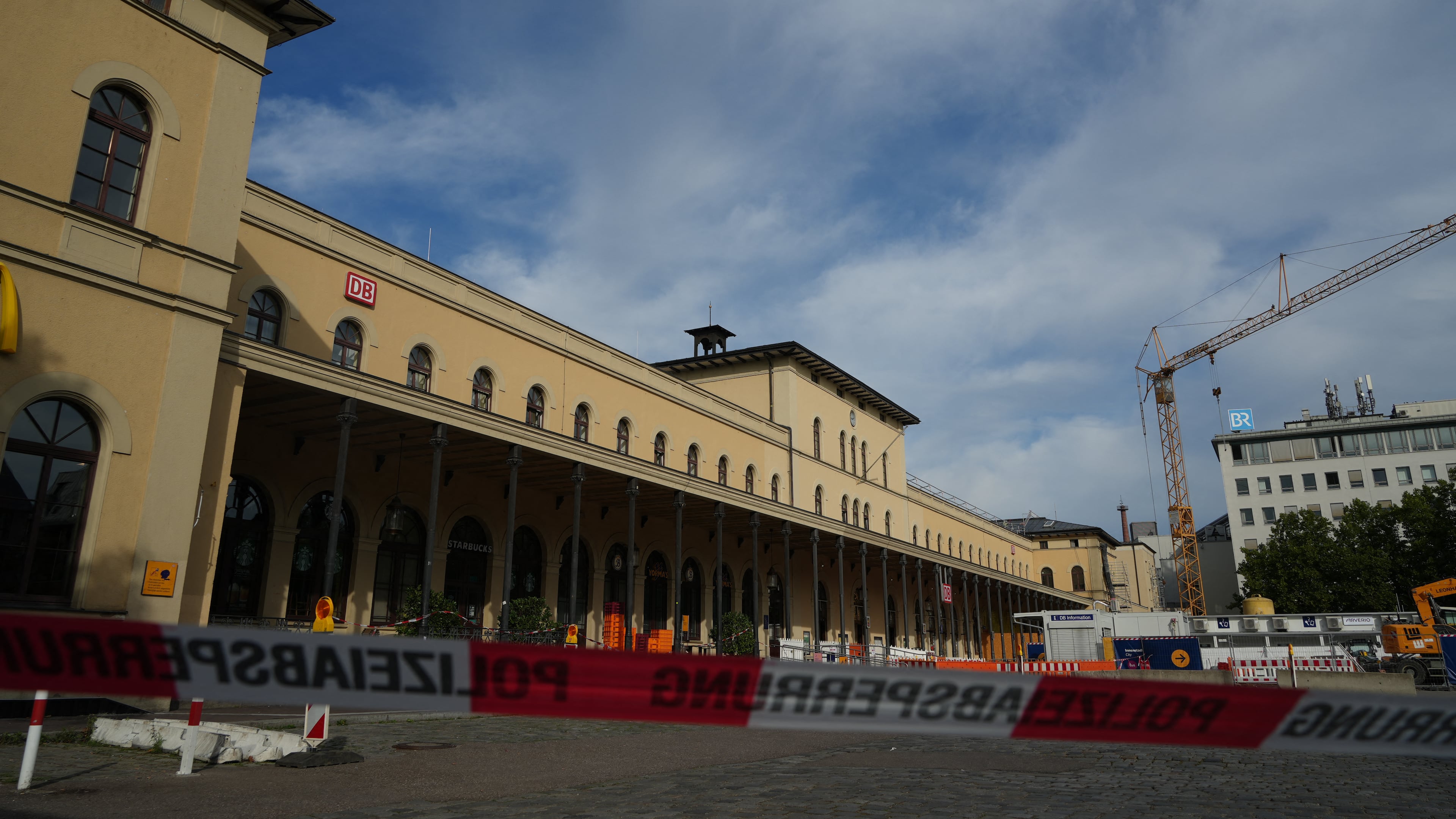 Police cordon off the area near the train station in the southern German city of Augsburg, Wednesday, Sept. 2, 2026. (Felix Kirberg/dpa via AP)