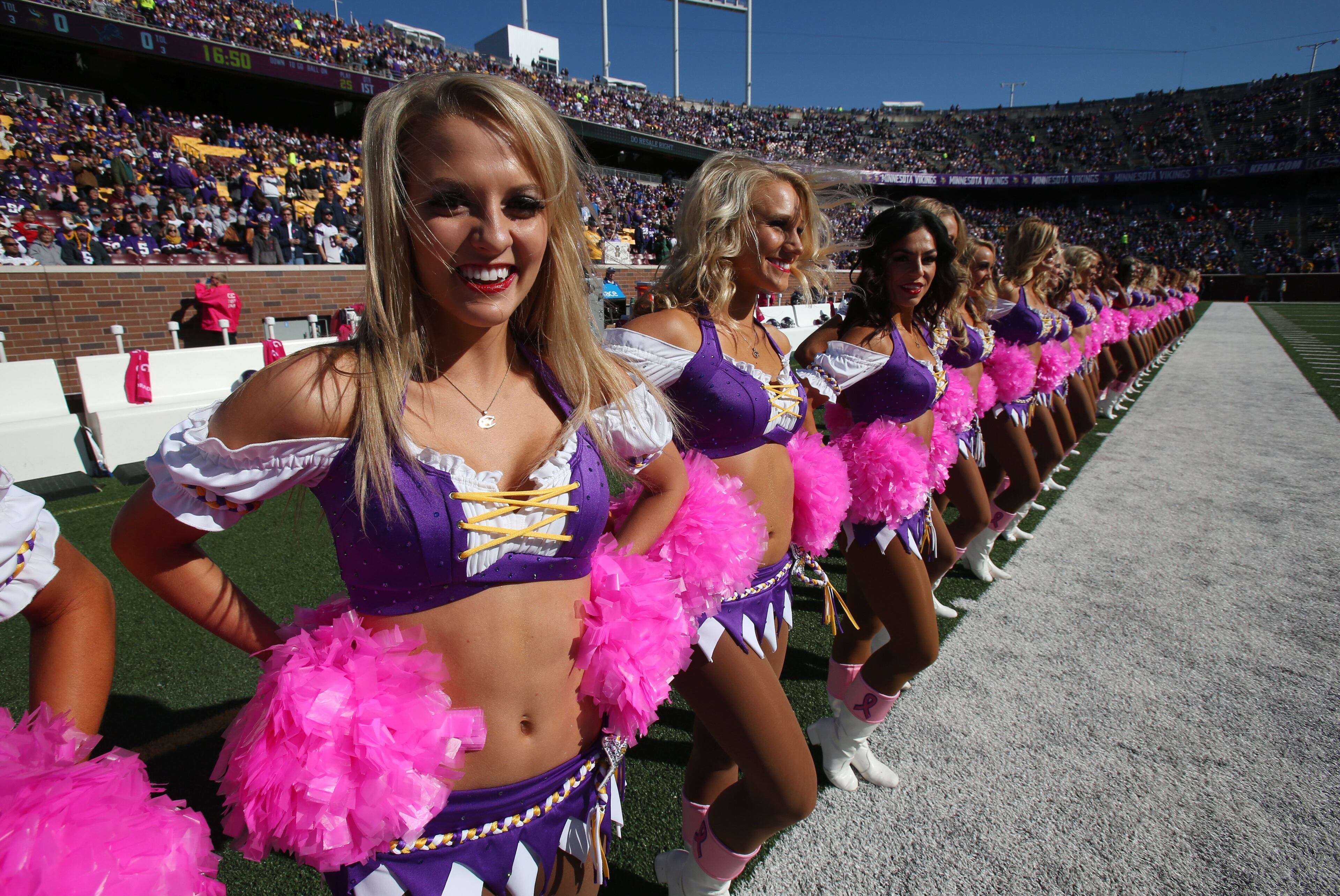 The Minnesota Vikings cheerleaders line up before an NFL football game against the Detroit Lions, Sunday, Oct. 12, 2014, in Minneapolis. (AP Photo/Jim Mone)