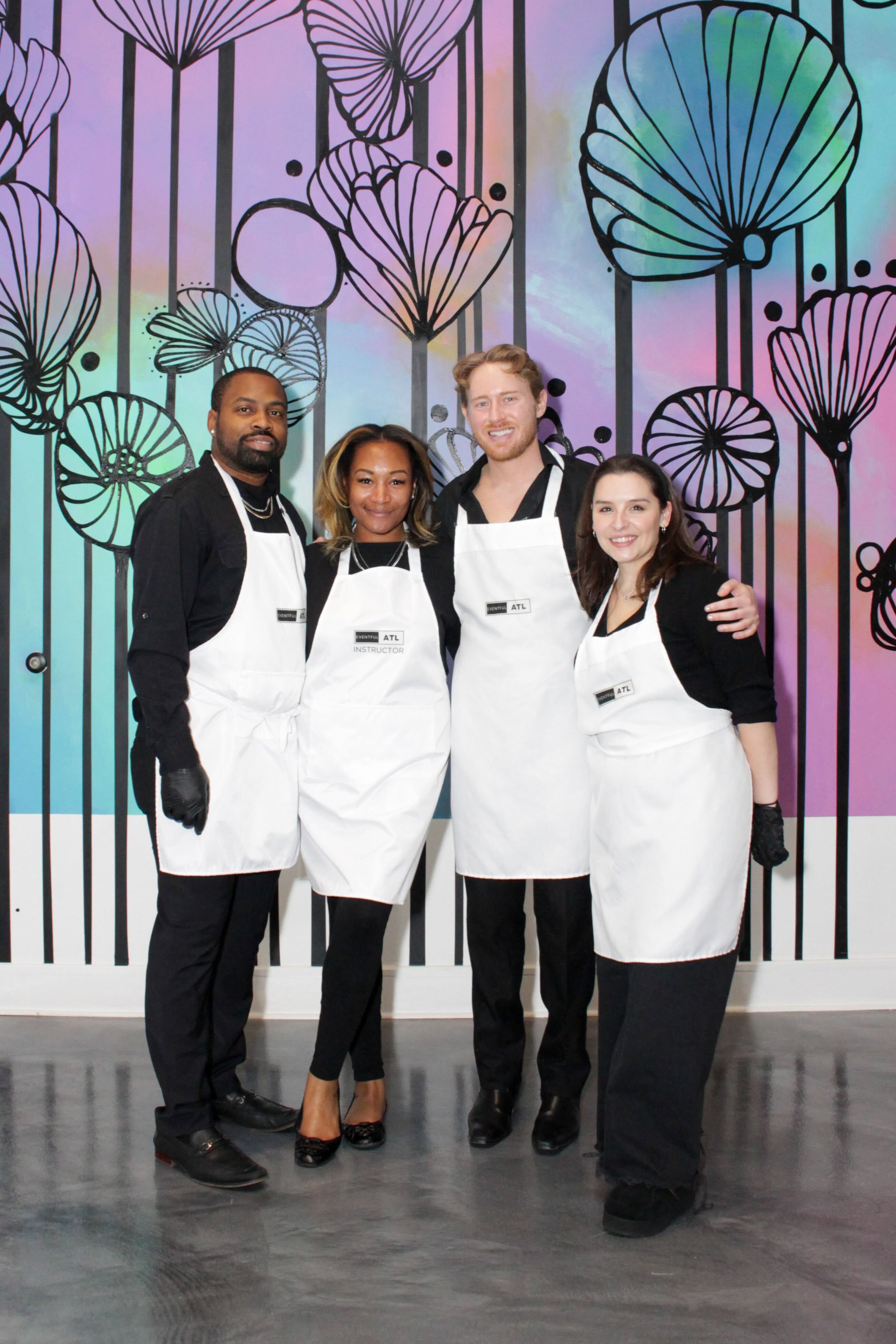 The Eventful ATL team includes (from left) event assistant Phillip George, caviar instructor Morgan Prime, host Taylor Kelly and flower arranging instructor Sydney Royer. (Courtesy of Eventful ATL)