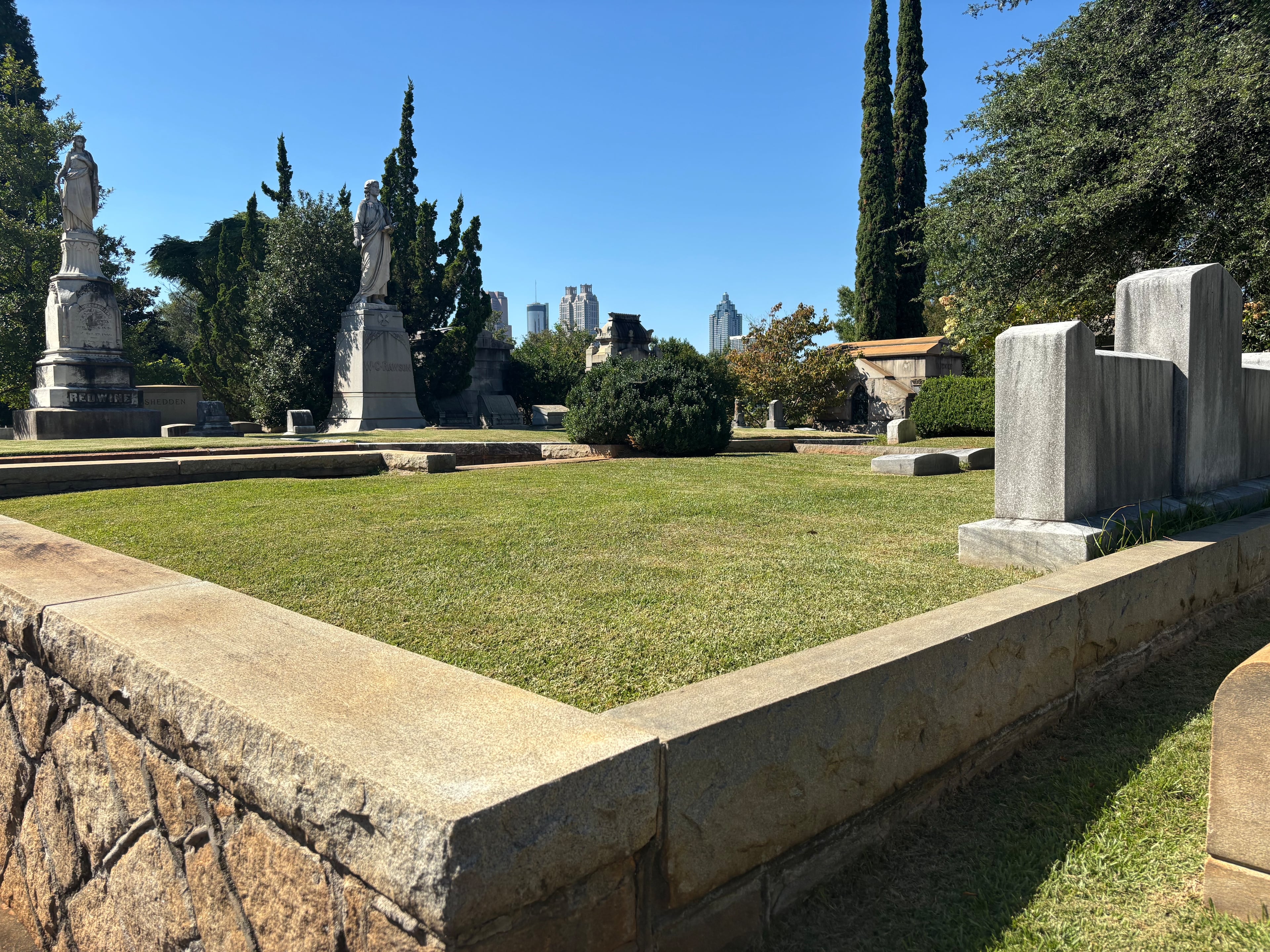 The downtown Atlanta skyline is seen from Oakland Cemetery. (David Aaro/AJC)