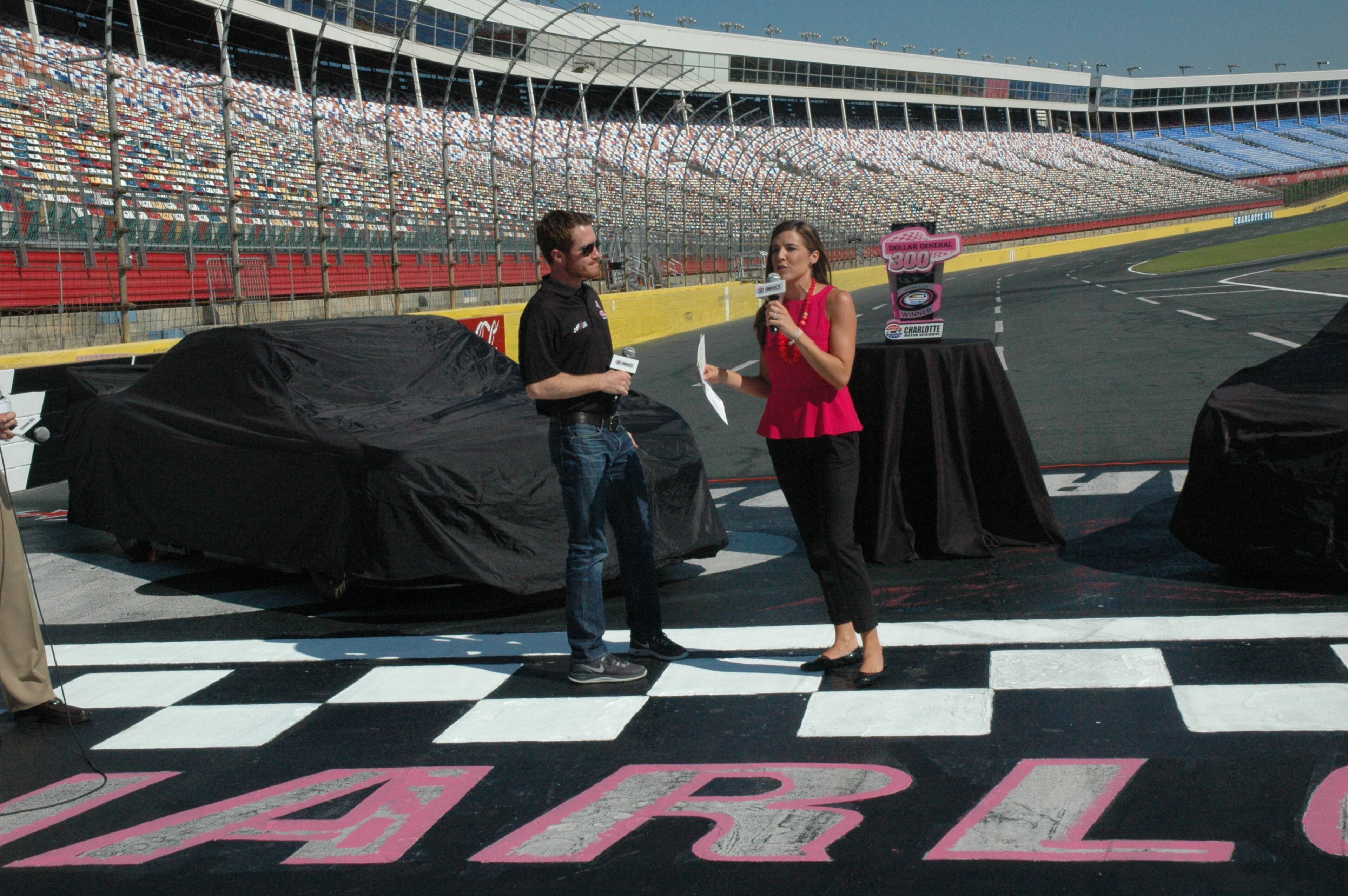 On Tuesday morning, NASCAR drivers Matt Kenseth, Brian Vickers and Elliot Sadler teamed up with breast cancer survivors to paint the pit wall at Charlotte Motor Speedway pink in honor of breast cancer awareness.
