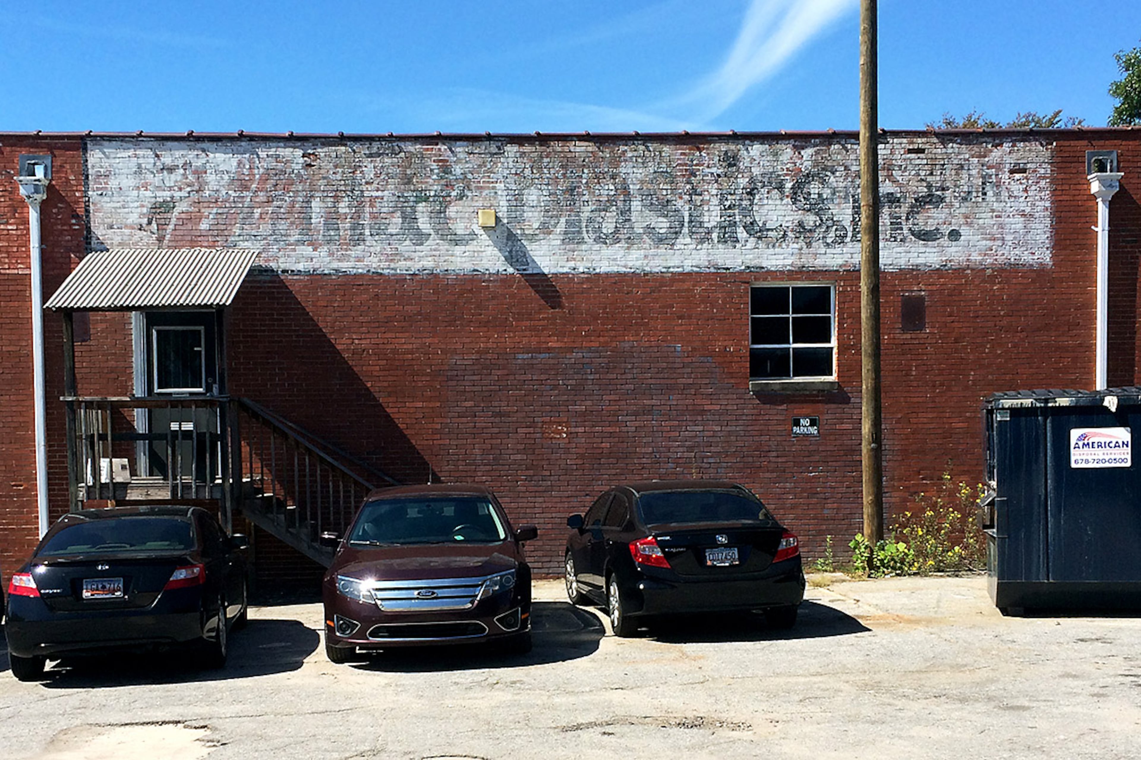 Means Street: You'll find plenty of old signage around Means Street, including this faded sign for a plastics company. (PETE CORSON / PCORSON@AJC.COM)