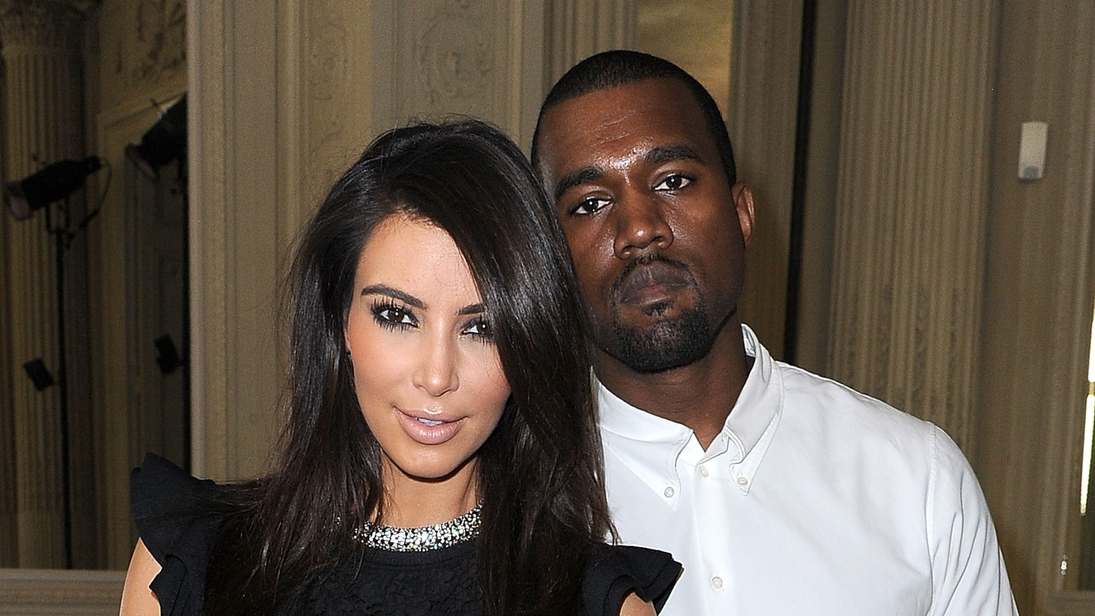 PARIS, FRANCE - JULY 04: Kim Kardashian and Kanye West attend the Valentino Haute-Couture show as part of Paris Fashion Week Fall / Winter 2012/13 at Hotel Salomon de Rothschild on July 4, 2012 in Paris, France. (Photo by Pascal Le Segretain/Getty Images)