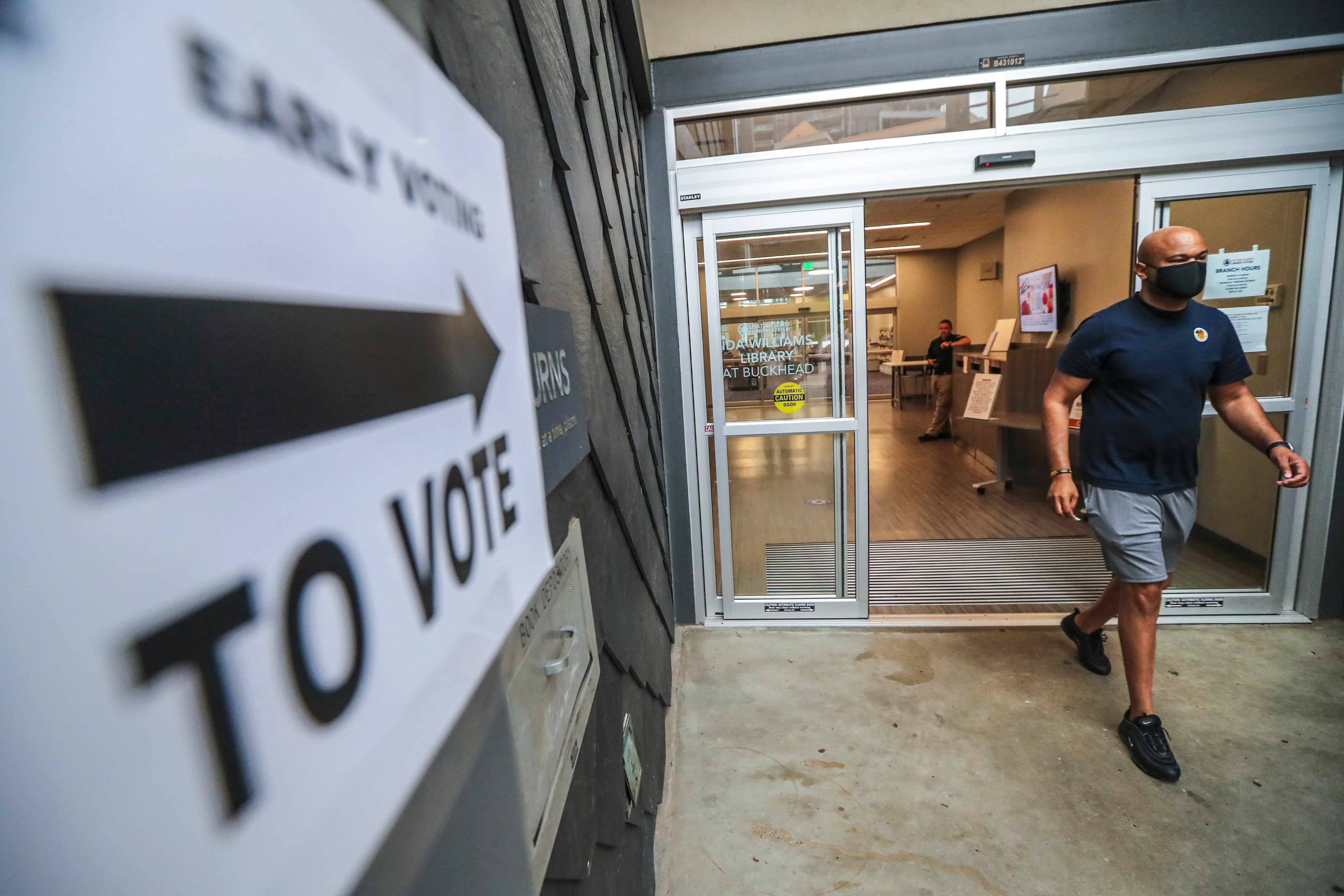 Kenneth French leaves the Buckhead Library after early voting in 2021. progressive Democrats in Atlanta have struggled to gain footing in city races, but a candidate's win in New York City offers new hope. (File/AJC 2021)