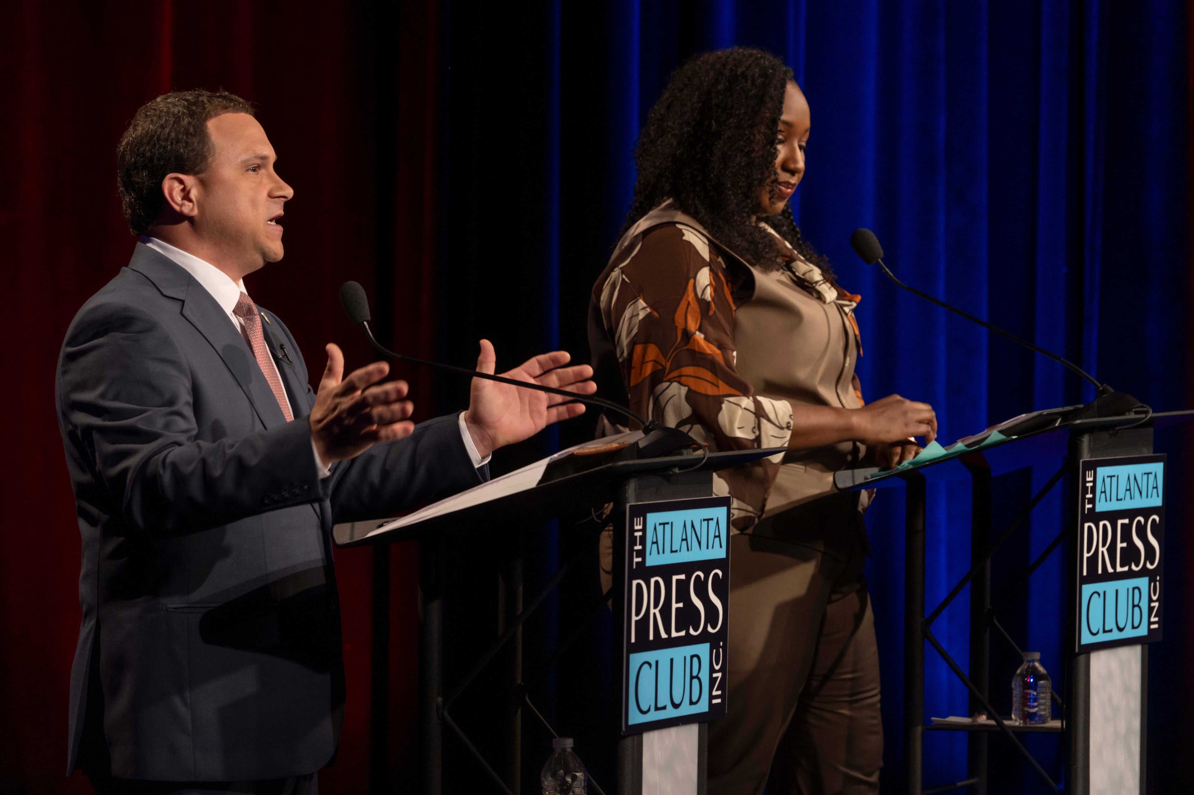 Incumbent Agriculture Commissioner Tyler Harper debates Democratic candidate Katherine Juhan-Arnold at the Atlanta Press Club's Loudermilk-Young Debate Series held Tuesday, Oct. 13, at the studios of Georgia Public Broadcasting. (Pool photo by Brian Cahn)