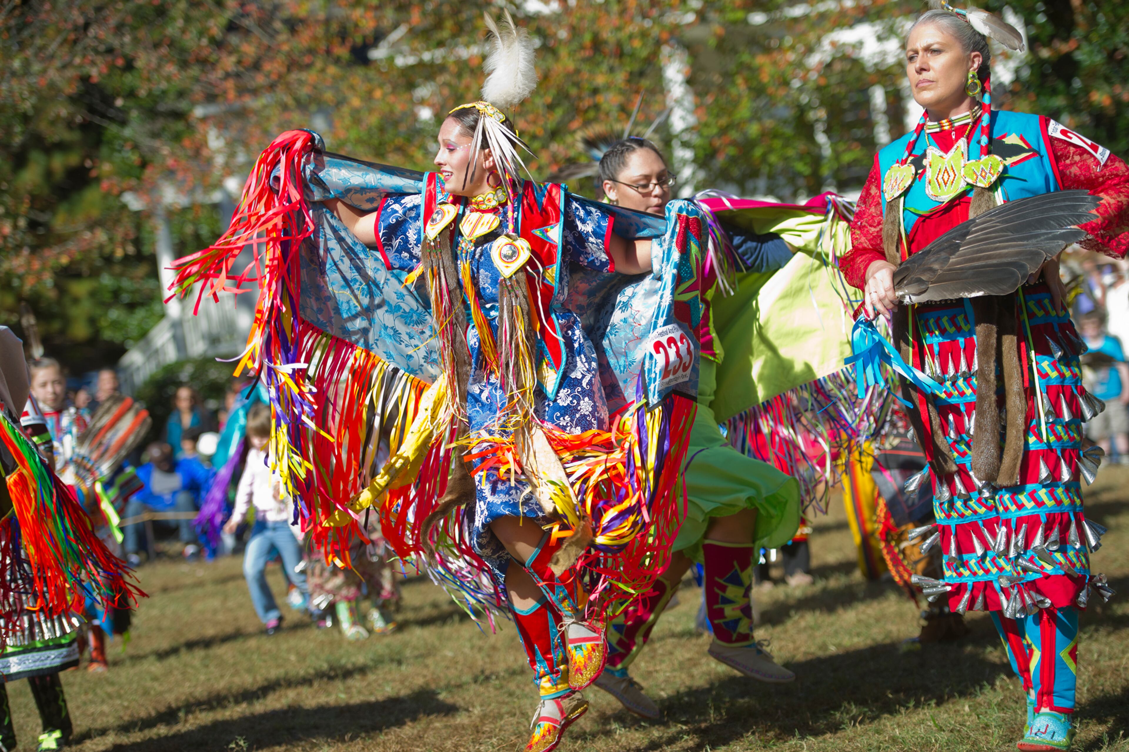 Tiffany Jolly (center) dances during the Indian Festival & Pow-Wow at Stone Mountain Park on Sunday, November 3, 2013. The four-day festival, held at the park's historic Antebellum Plantation, showcases Native American culture through dance, music, authentic craft demonstrations, cooking traditions, storytelling, wildlife presentations and more. JONATHAN PHILLIPS / SPECIAL