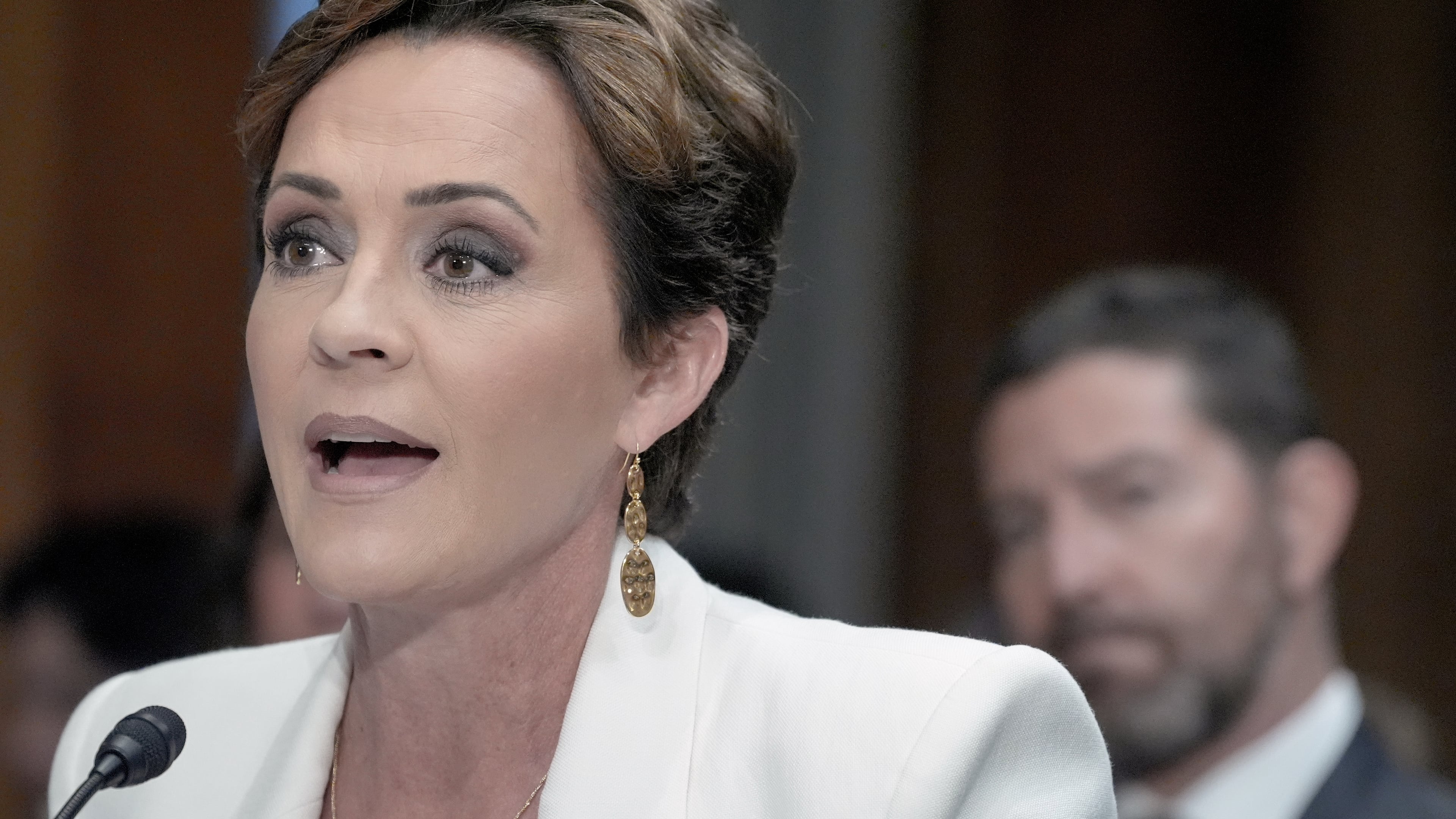 FILE - Kari Lake testifies during a Senate Committee on Foreign Relations hearing to examine her nomination to be Ambassador to Jamaica, on Capitol Hill, June 18, 2026, in Washington. (AP Photo/Mariam Zuhaib, File)