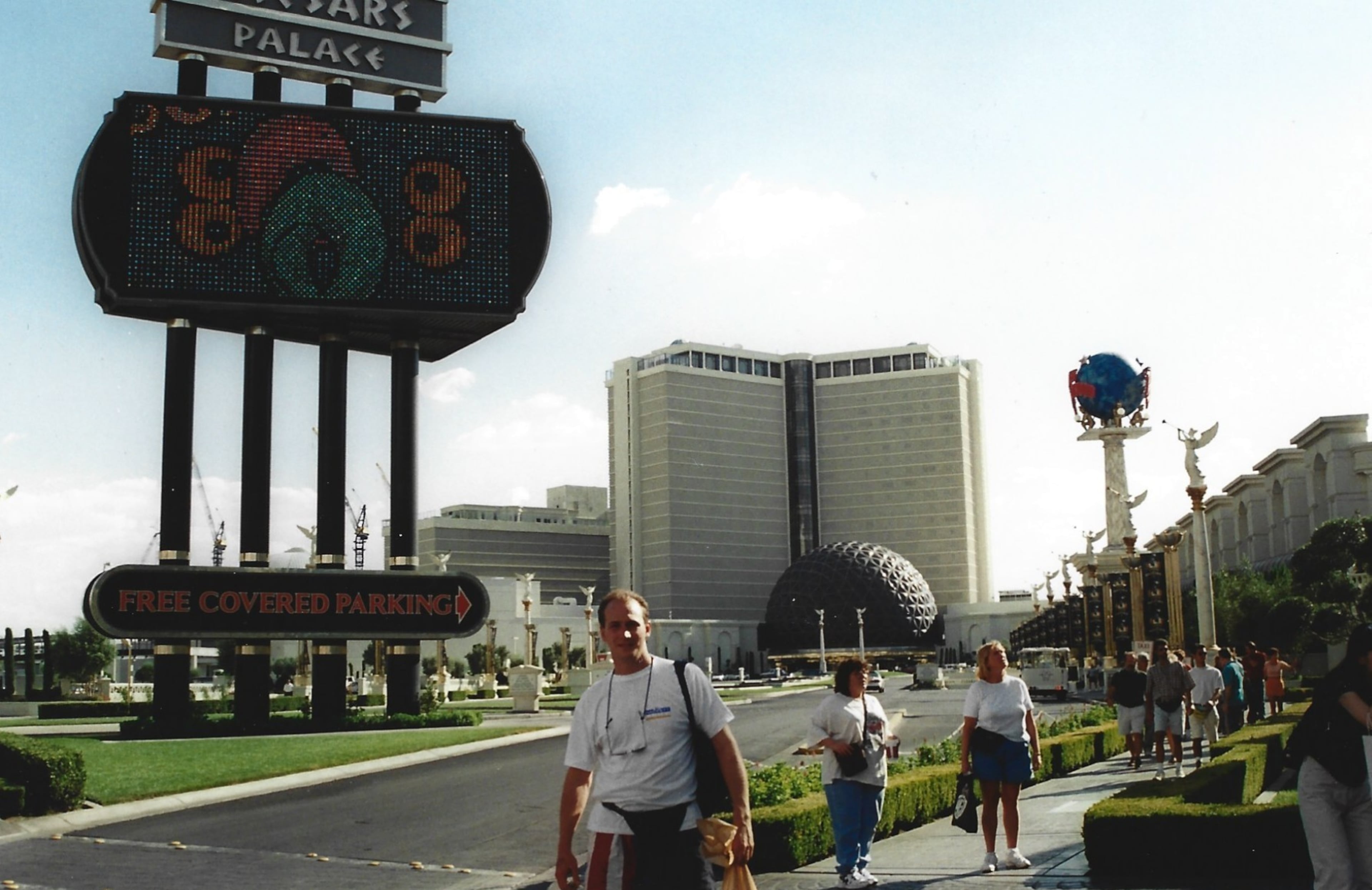 Steve stands in front of a Caesar's Palace sign in Las Vegas, Nevada. (Courtesy of Steve Leo)
