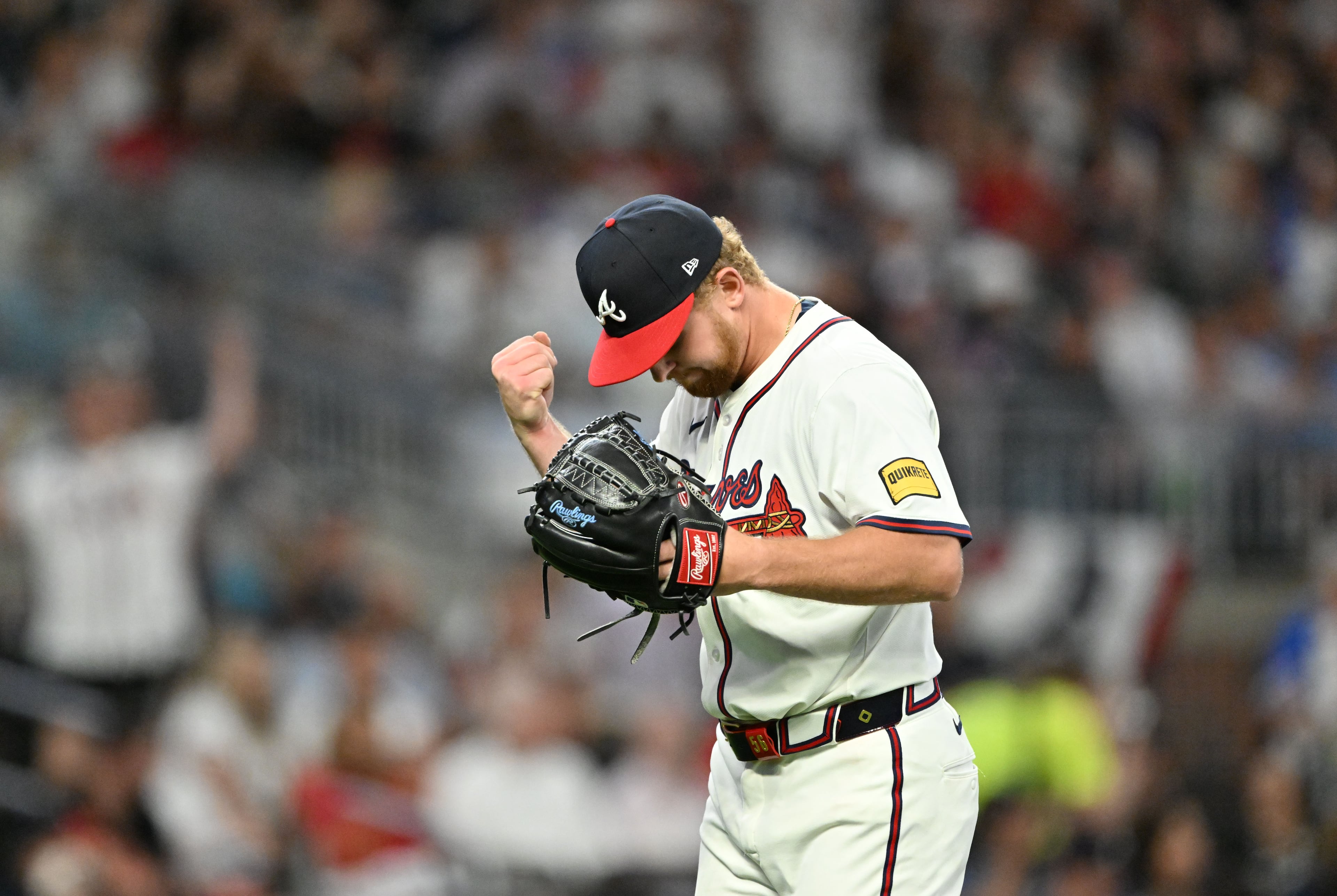 Braves pitcher Spencer Schwellenbach reacts after a strikeout during the team's home opener on April 4.