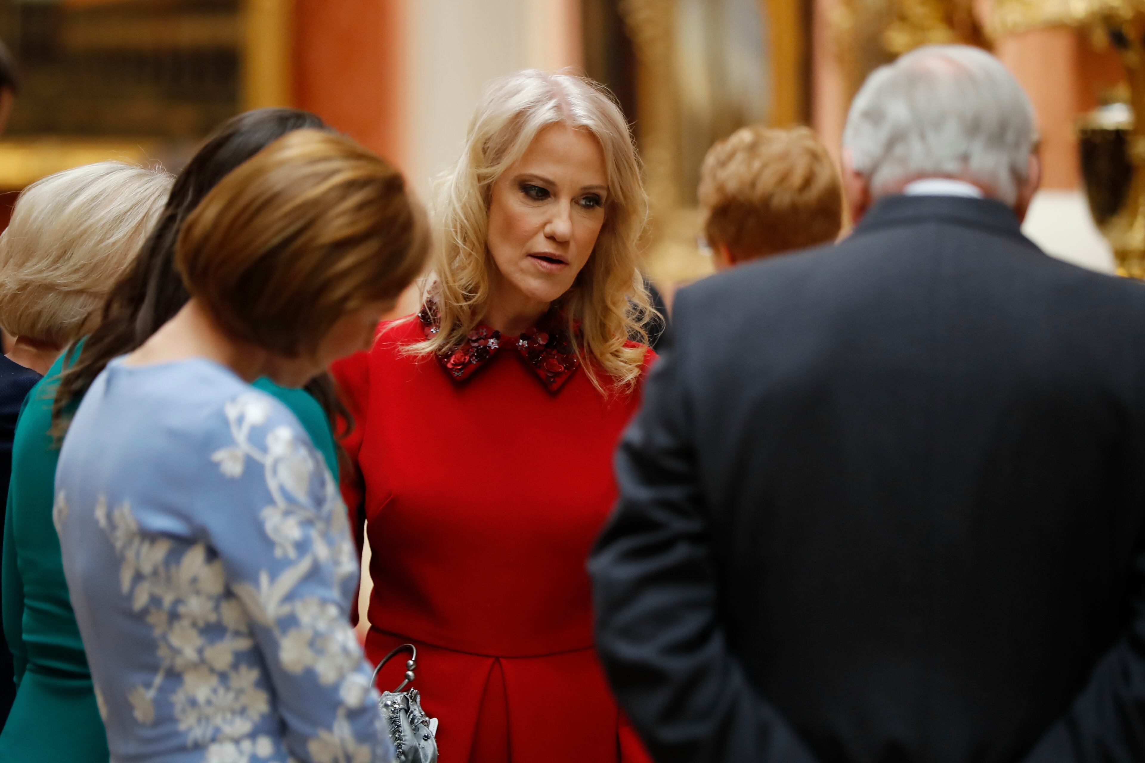 Counselor to the US President Kellyanne Conway, center, views U.S memorabilia from the Royal Collection, at Buckingham Palace, London, Monday, June 3, 2019. Trump is on a three-day state visit to Britain. (Tolga Akmen/Pool Photo via AP)