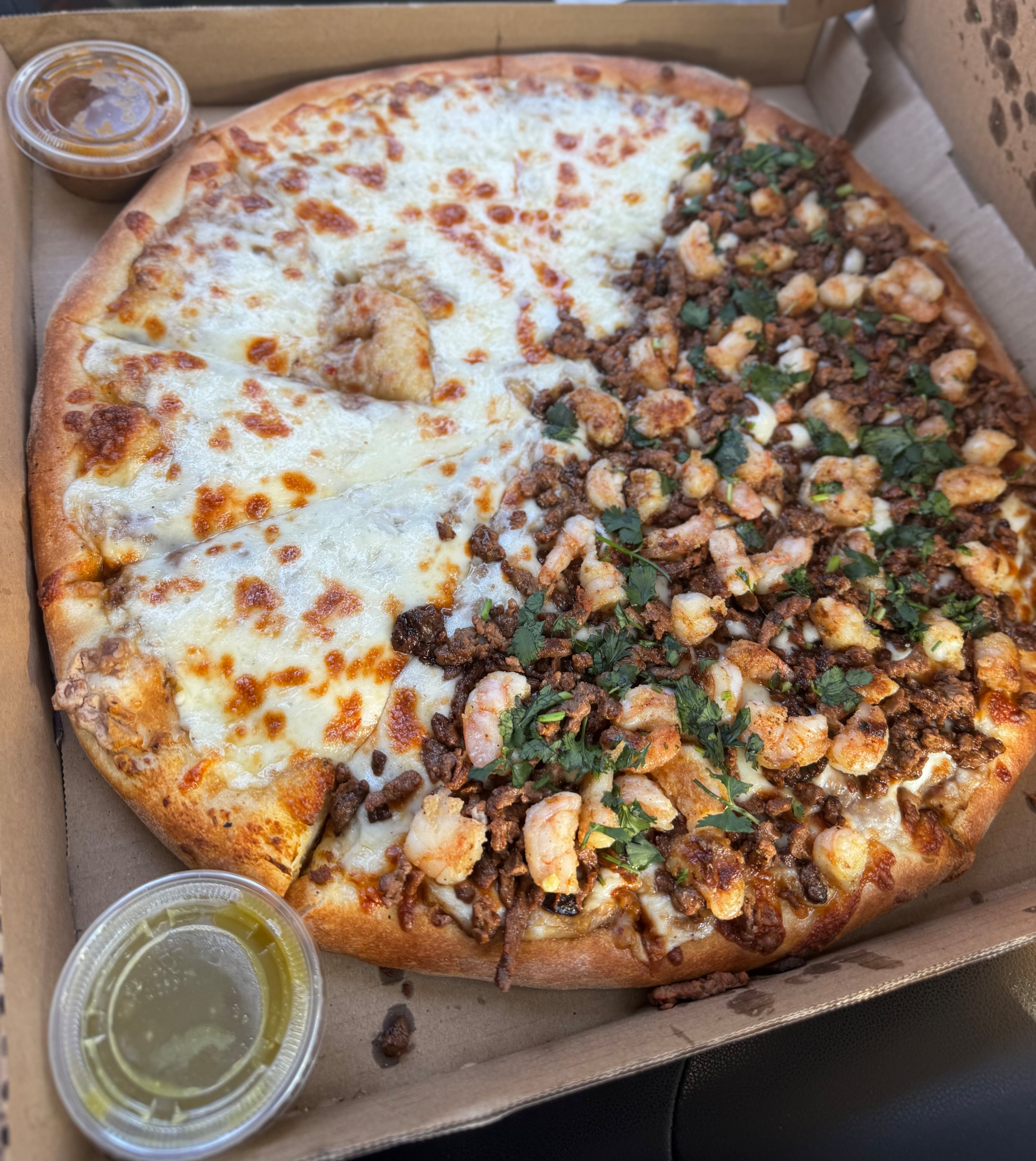 This Mexican pizza from La Morena Supermarket is topped with half cheese and half carne asada. (Justin Brown for the AJC)