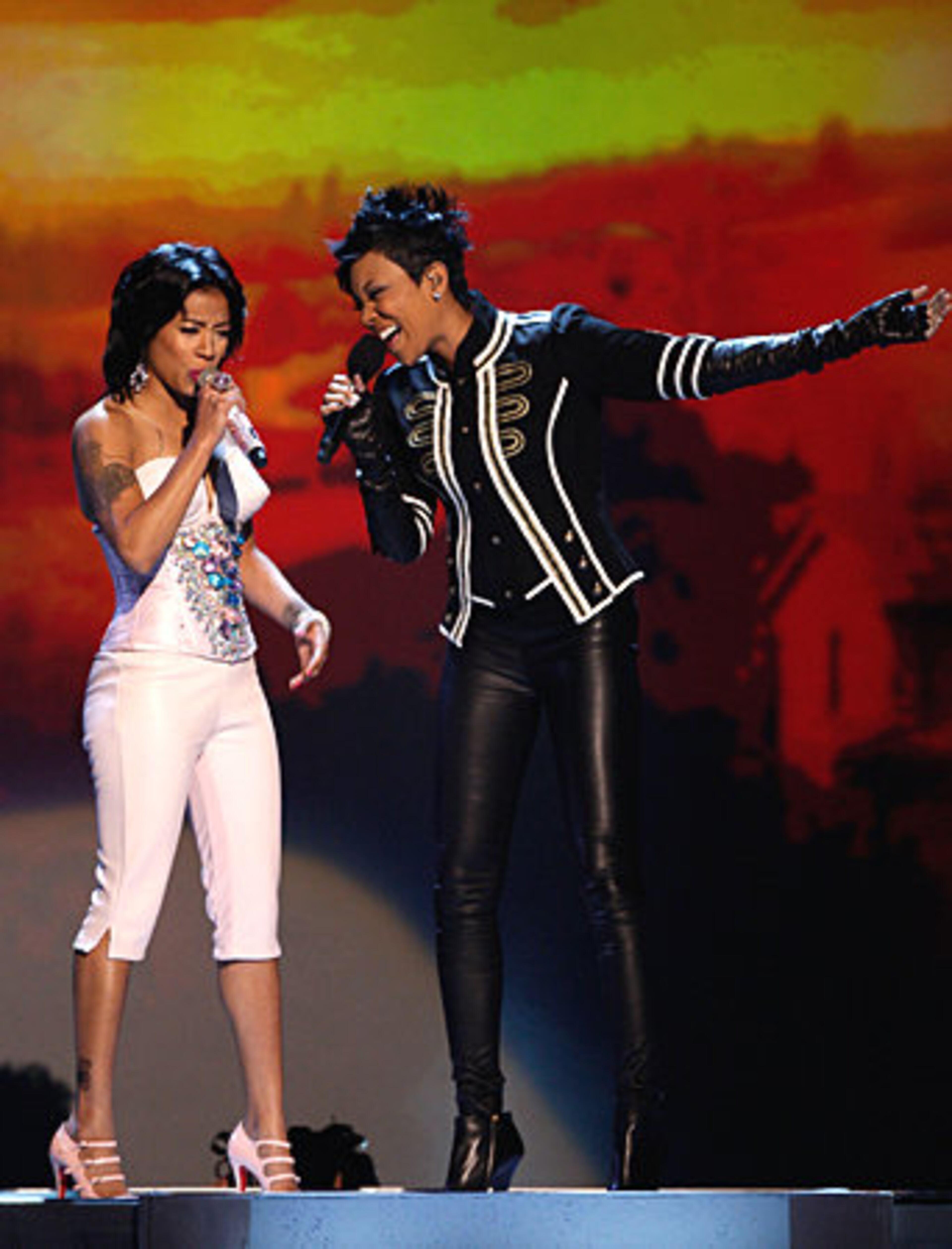 Atlanta's own singers Keyshia Cole (L) and Monica perform onstage.