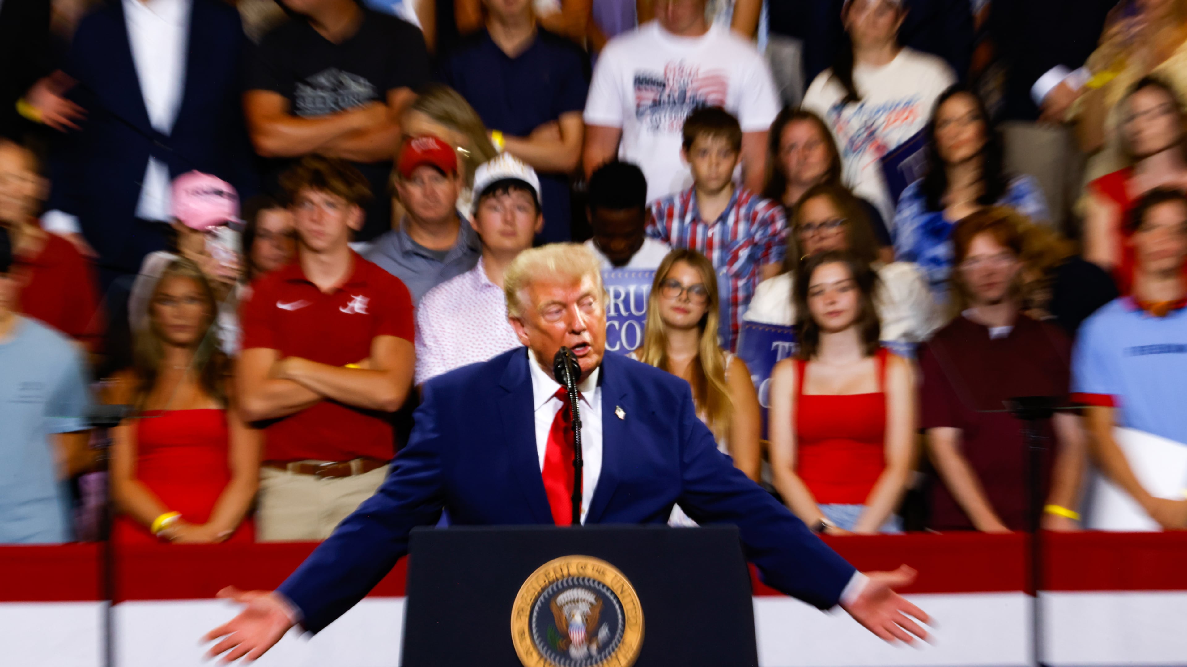 President Donald Trump speaks at Wheeler High School in Marietta in July. (Arvin Temkar/AJC)