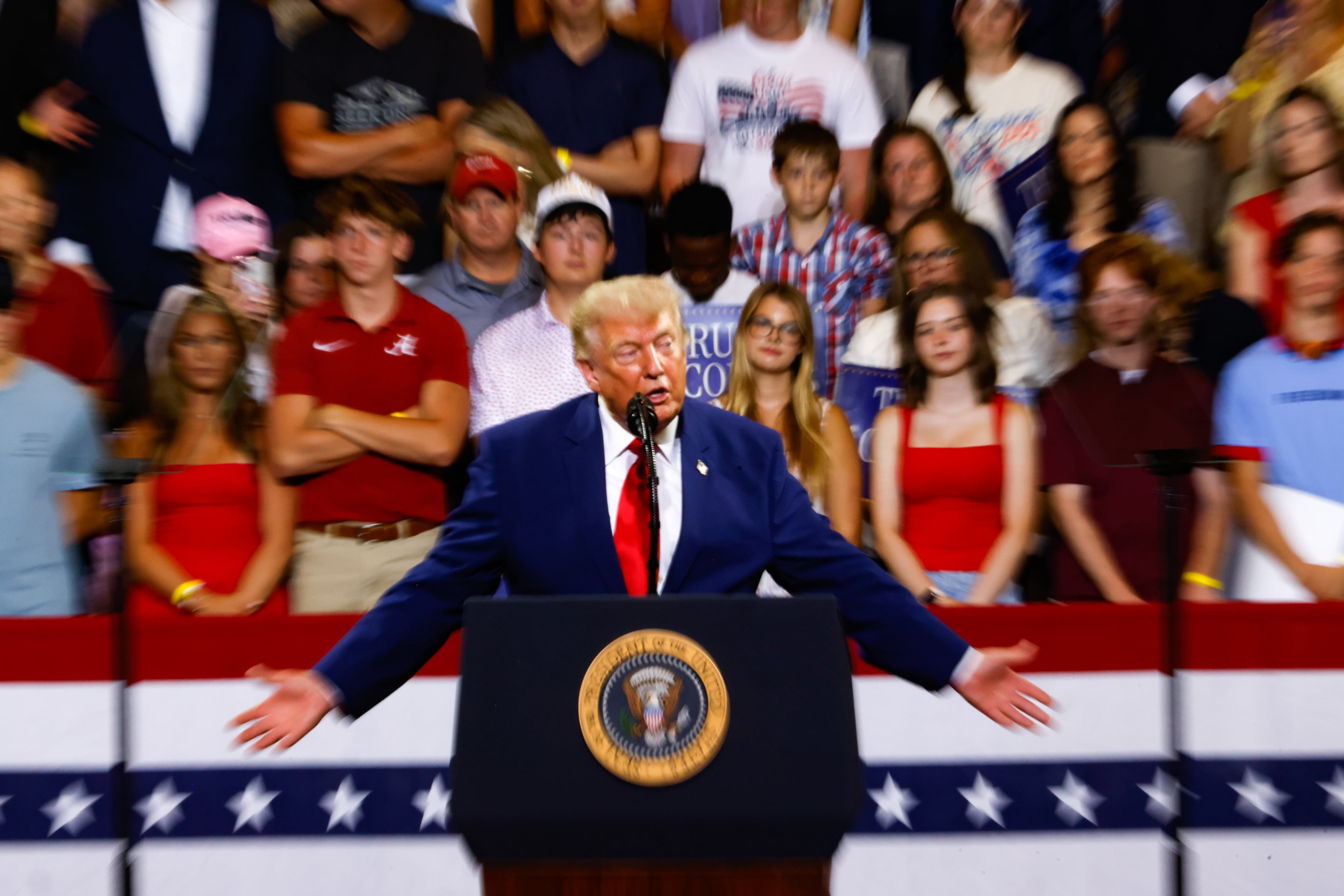 President Donald Trump speaks at Wheeler High School in Marietta in July. (Arvin Temkar/AJC)