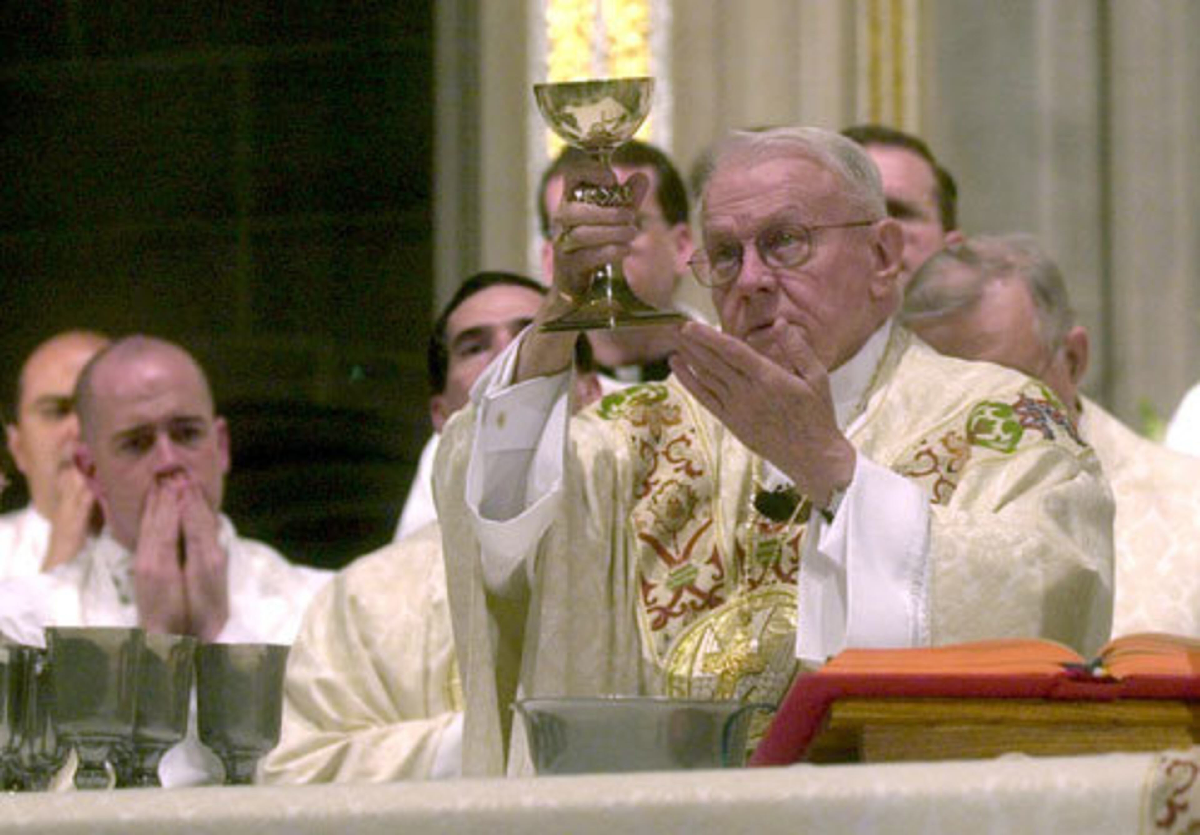 In this Jan. 10, 2005 photo, Archbishop John Francis Donoghue celebrates the Eucharist at the Cathedral of Christ the King in Buckhead during a mass in his honor ahead of his then-upcoming retirement.