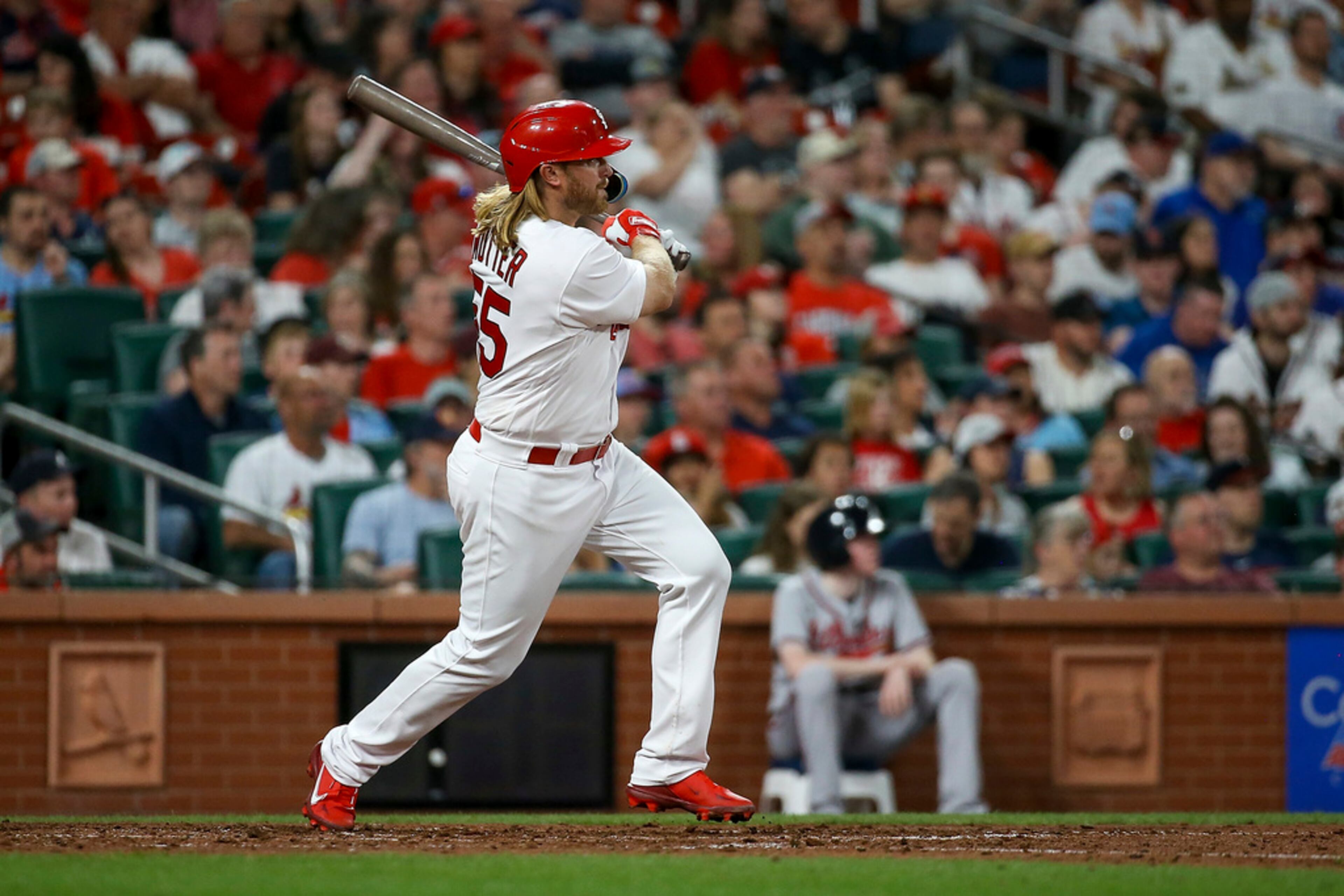St. Louis Cardinals' Taylor Motter follows through on a double during the fifth inning of the team's baseball game against the Atlanta Braves Tuesday, April 4, 2023, in St. Louis. (AP Photo/Scott Kane)