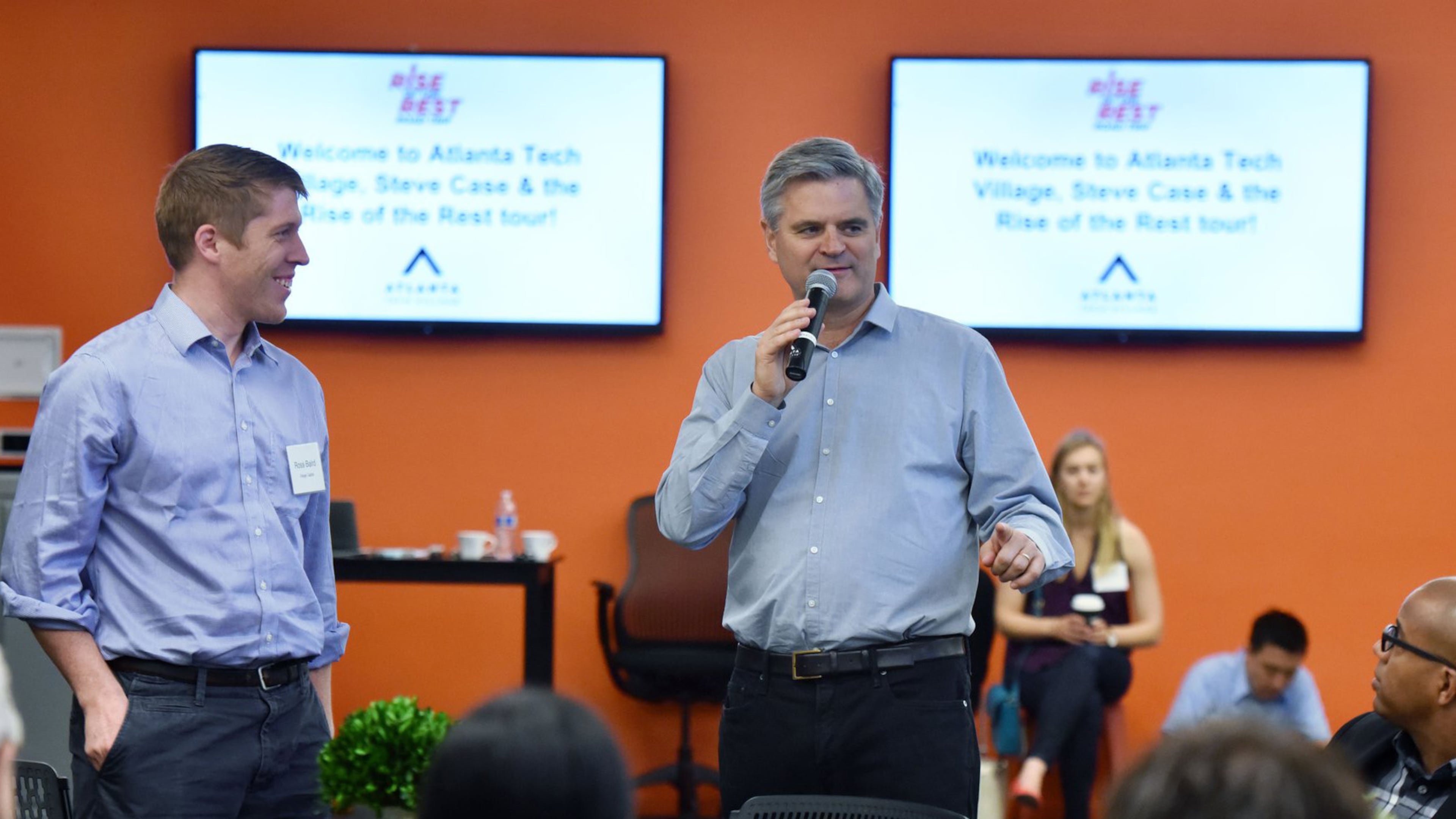 AOL co-founder Steve Case speaks as Ross Baird (left), Executive Director of the Village Capital, looks on at Atlanta Tech Village. Case was in Atlanta to promote his 'Rise of the Rest' campaign.