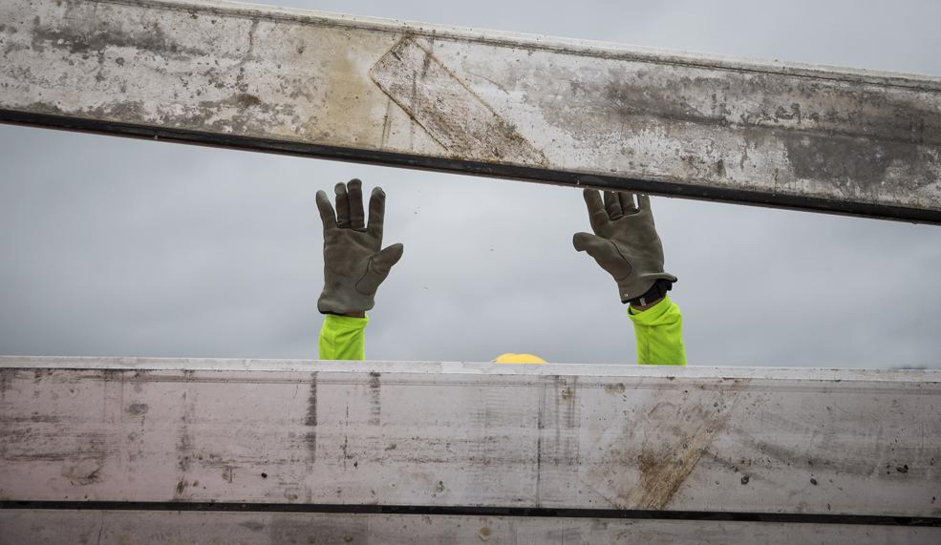 TxDOT crews install the final portion of a surge wall on TX-361 leading to the Port Aransas ferry in Aransas Pass, Texas, on Friday, August 25, 2017. Hurricane Harvey is expected to make landfall on the Texas coast tonight or early Saturday morning as a category 3 hurricane