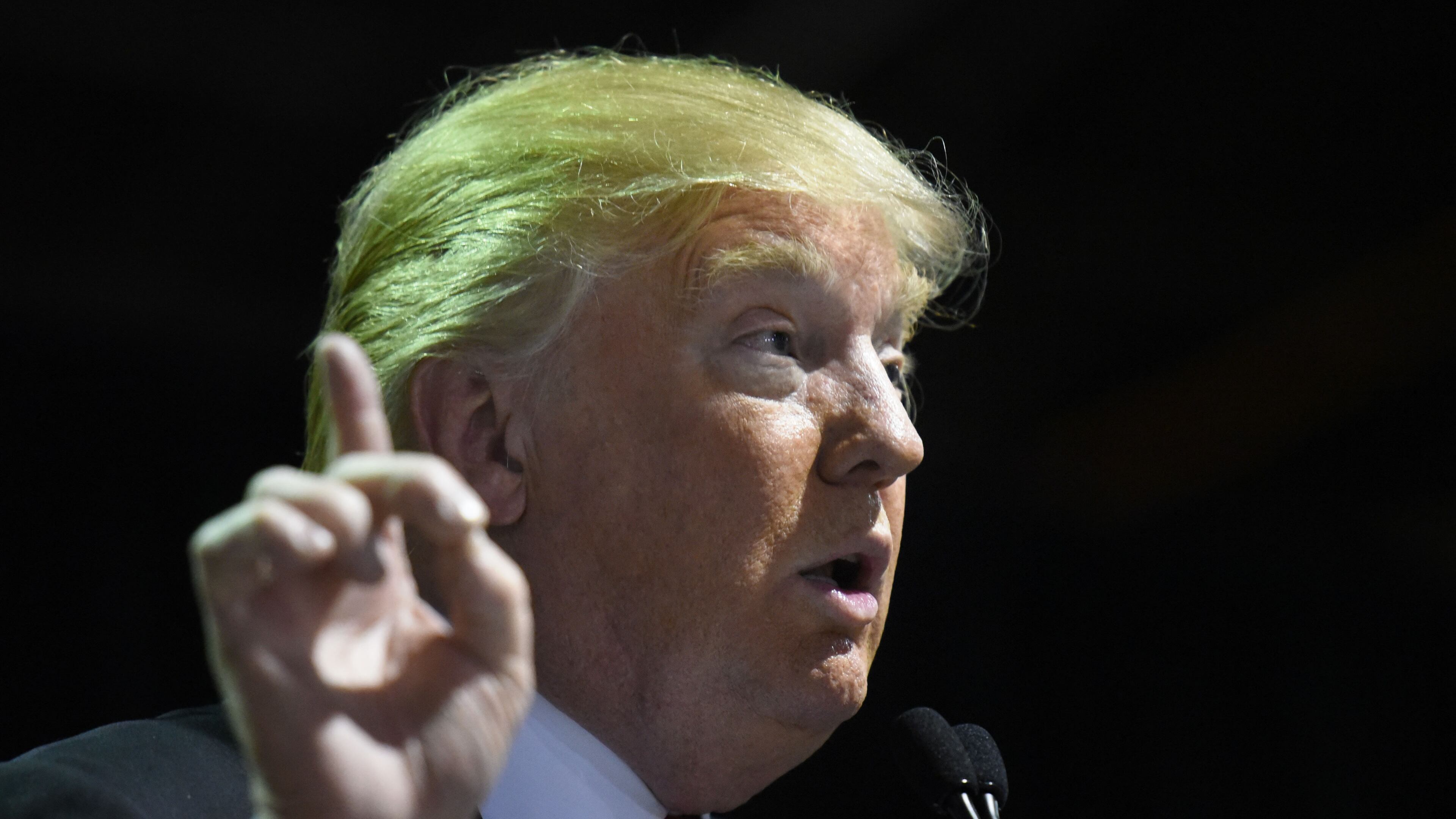 Republican frontrunner Donald Trump speaks at Georgia World Congress Center on Sunday. Hyosub Shin, hshin@ajc.com