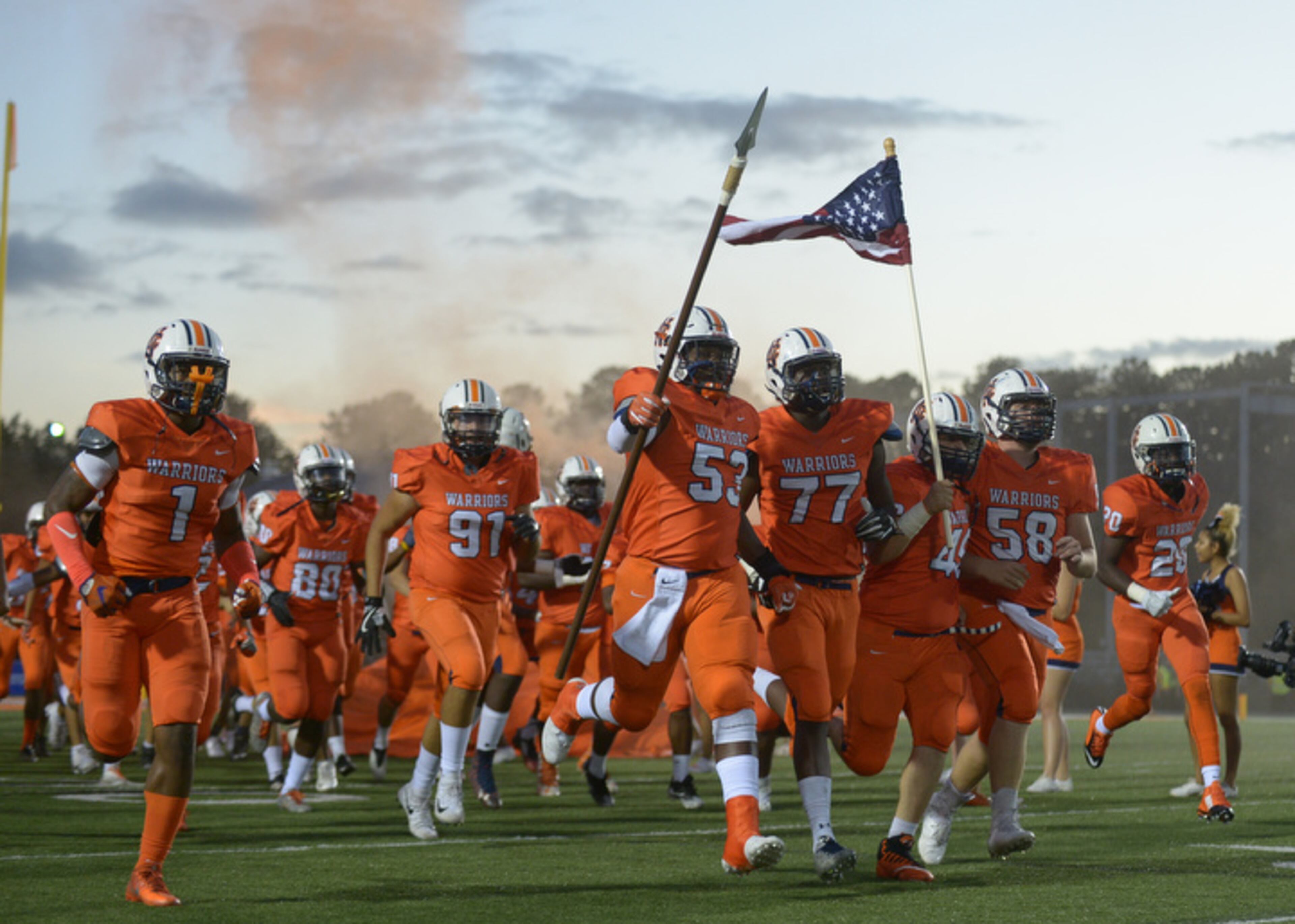 Kennesaw, Ga. -- The North Cobb Warriors take the field before the start of their home game against the McEachern Indians Friday, October 6, 2017. Special/Daniel Varnado