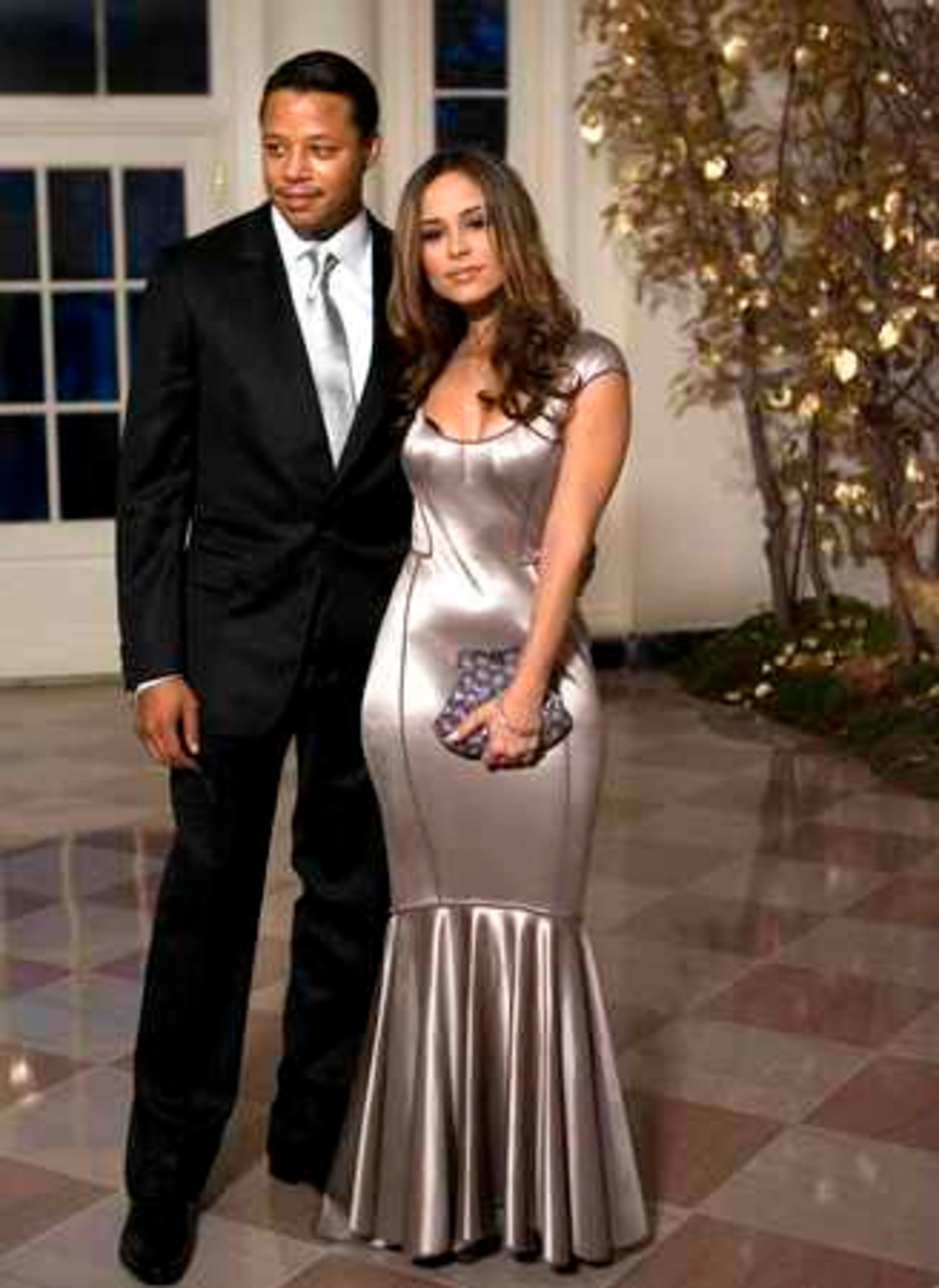 Actor Terrence Howard and his companion, Zulay Henao, arrive at the White House for a reception honoring the recipients of the Kennedy Center Honors Award for 2007