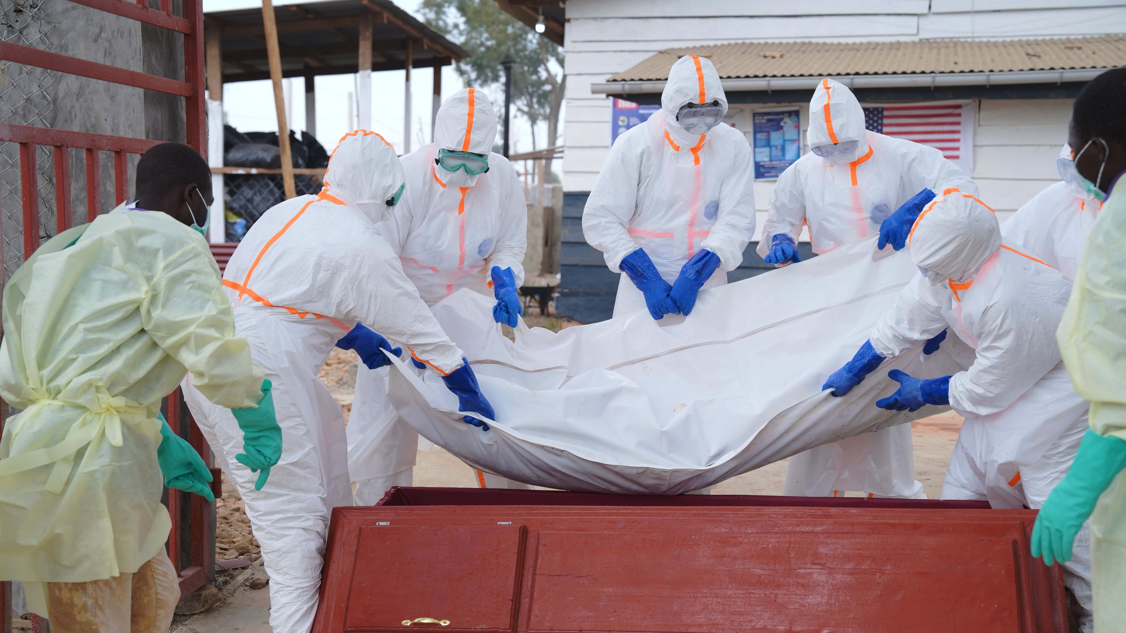 Health workers who are members of the safe and dignified burial team prepare to bury Abineno Justine, a 38 year old woman who died of the Ebola virus, in Bunia, Congo, Friday, Sept. 4, 2026. (AP Photo/Dieudonne Dirole)