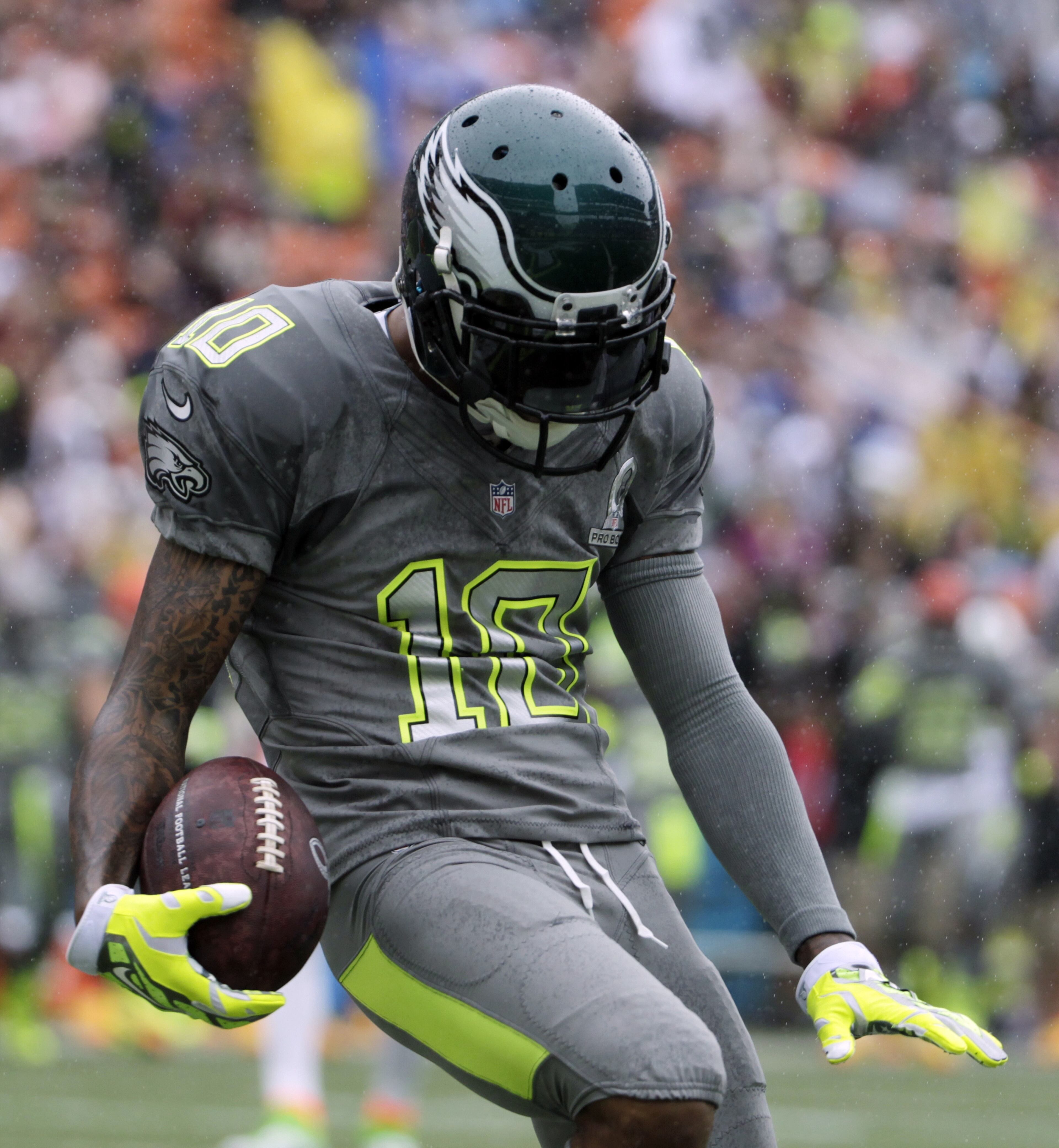 Philadelphia Eagles DeSean Jackson (10) of Team Sanders celebrates after making a catch for a touchdown in the first half during the Pro Bowl, Sunday, Jan. 26, 2014, at Aloha Stadium in Honolulu. (AP Photo/Eugene Tanner)