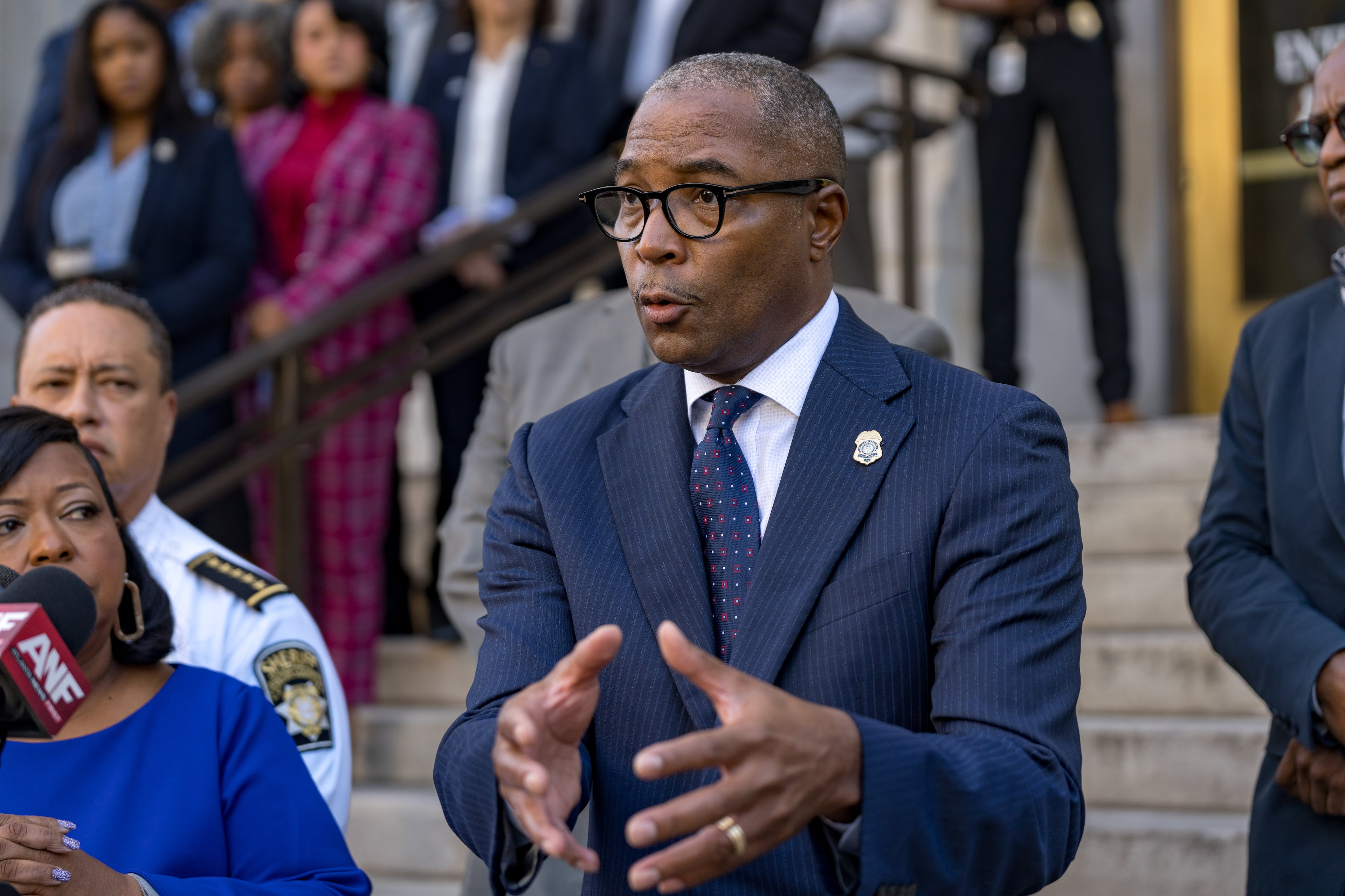 Fulton County Solicitor General Keith Gammage, seen here at a news conference last week in Atlanta, said he is proud of his Operation Feed Fulton program. (Ben Hendren for the AJC)