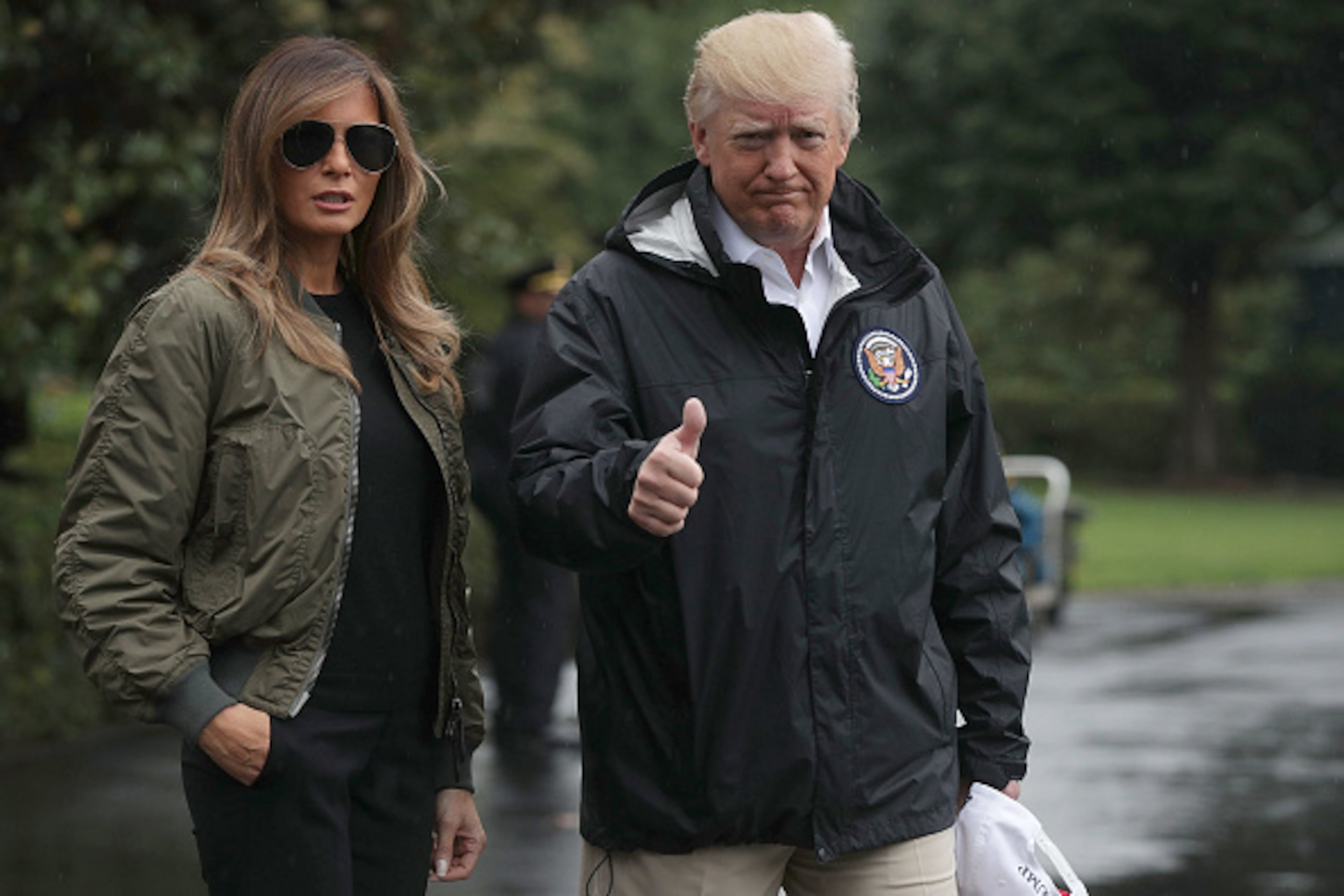 WASHINGTON, DC - AUGUST 29: U.S. President Donald Trump gives a thumbs up as he walks with first lady Melania Trump prior to their Marine One departure from the White House August 29, 2017 in Washington, DC. President Trump was traveling to Texas to observe the Hurricane Harvey relief efforts. (Photo by Alex Wong/Getty Images)