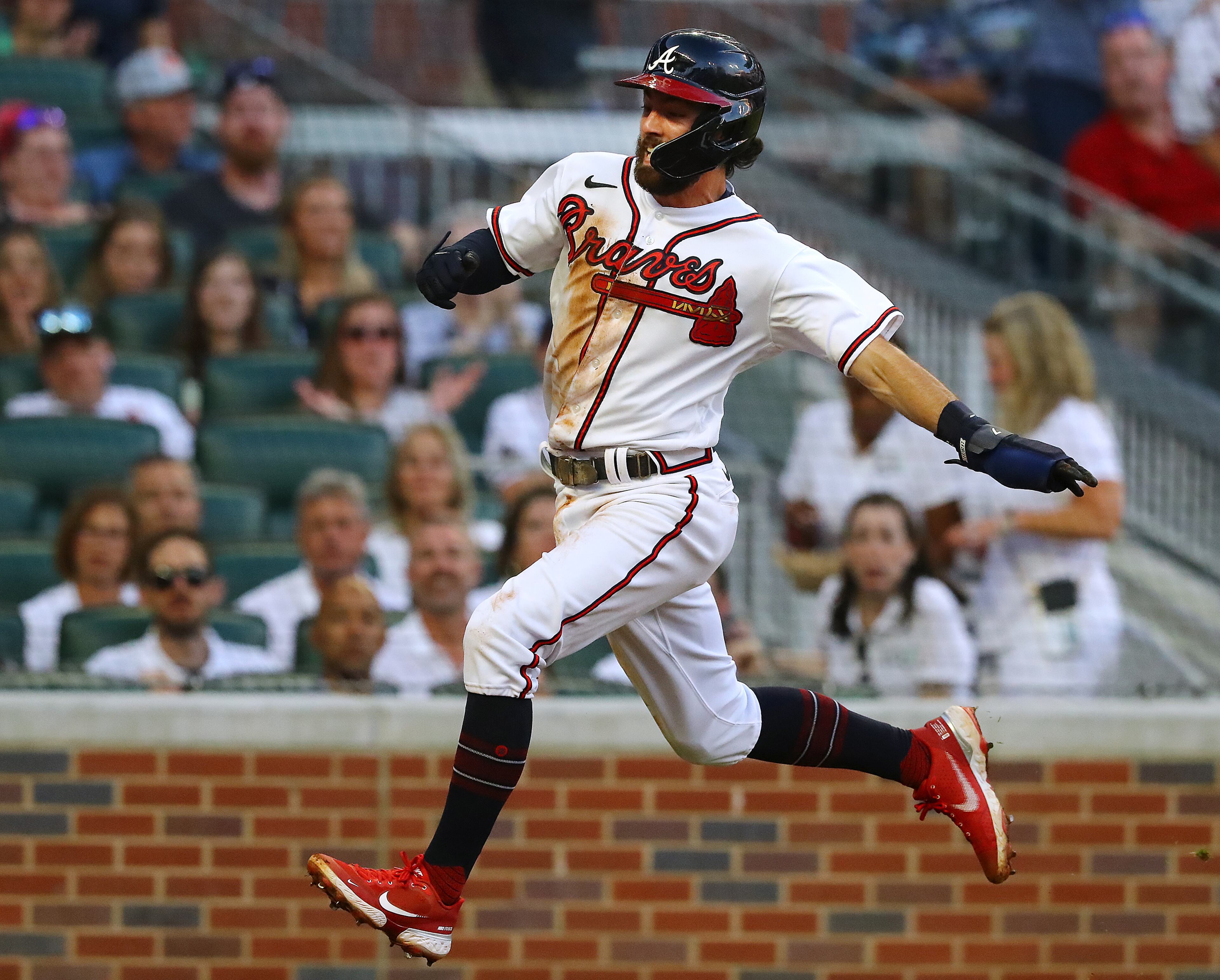 Braves shortstop Dansby Swanson goes home to score on a RBI double by Travis d'Arnaud for a 3-0 lead over the Pittsburgh Pirates during the third inning in a MLB baseball game on Thursday, June 9, 2022, in Atlanta. “Curtis Compton / Curtis.Compton@ajc.com”