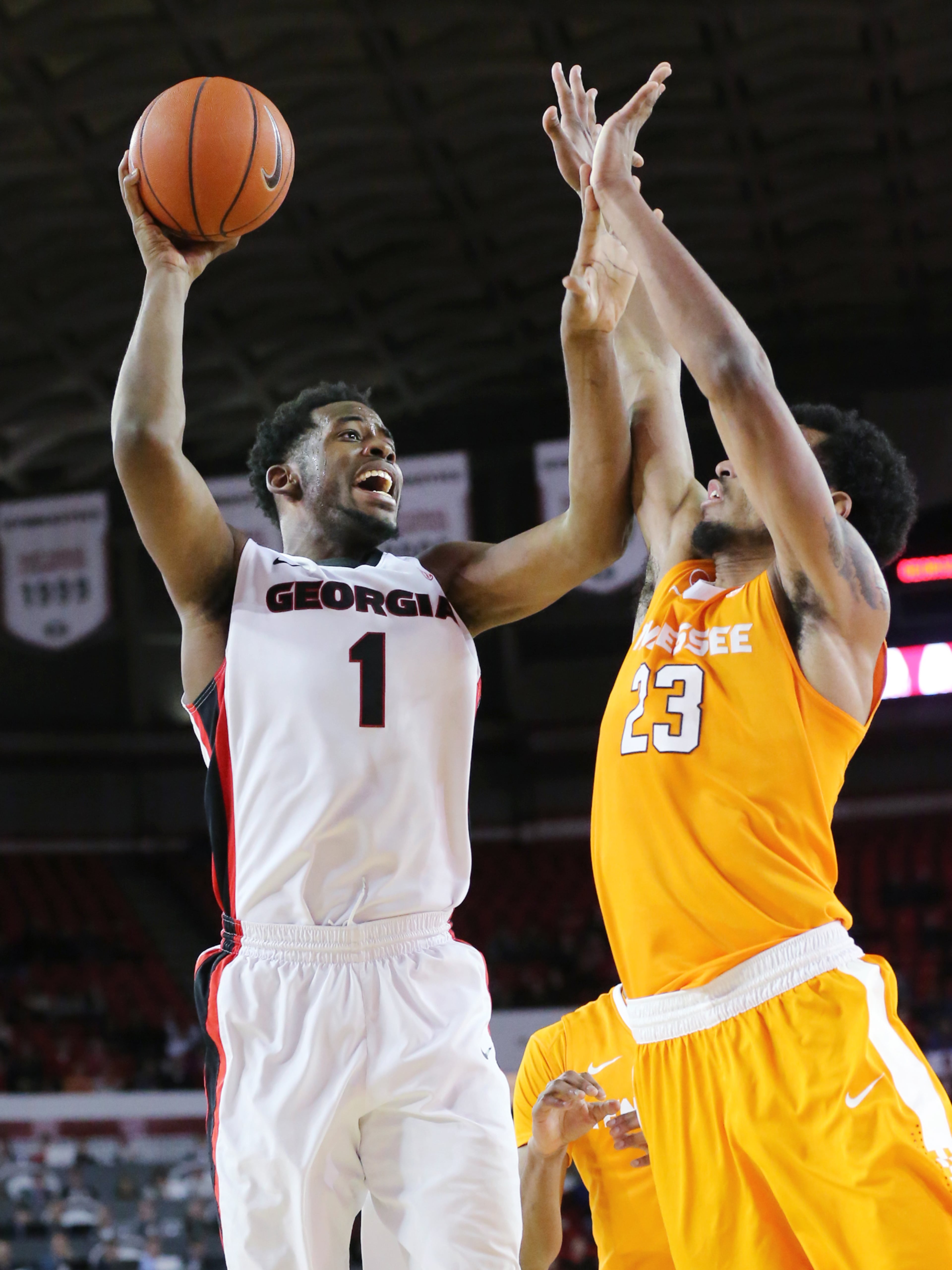 Georgia forward Yante Maten shoots over Tennessee forward Derek Reese for two points in a basketball game on Wednesday, Jan. 13, 2016, in Athens. Georgia beat Tennessee 81-72. Curtis Compton / ccompton@ajc.com