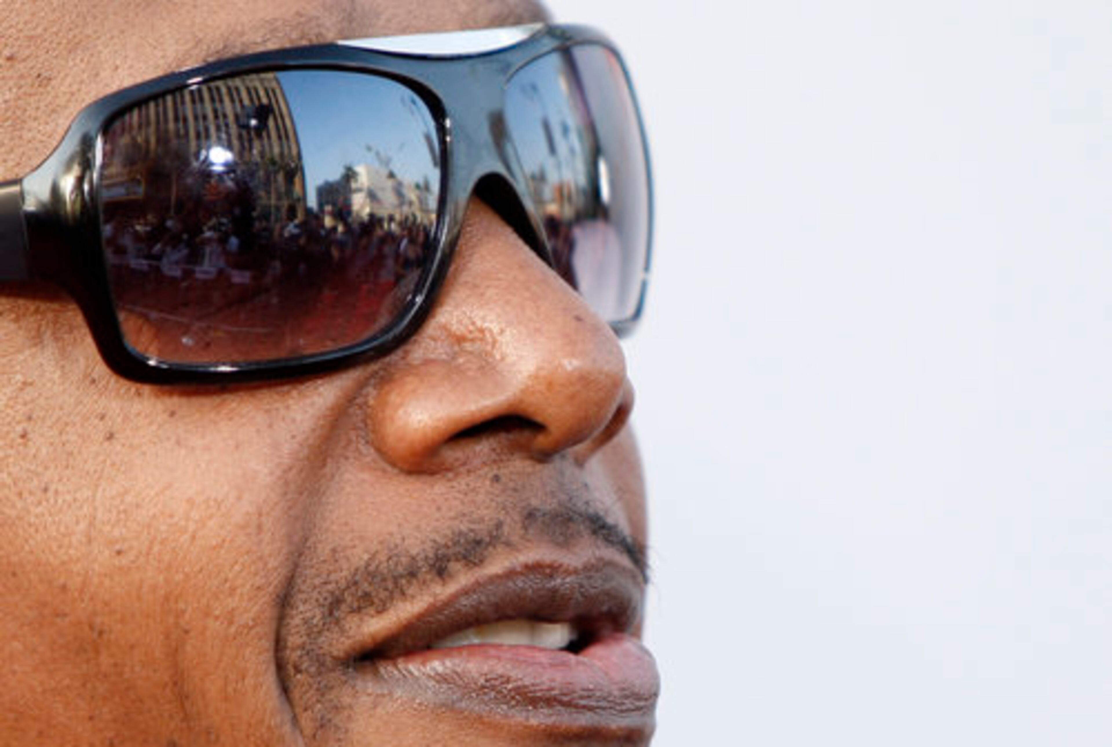 MC Hammer scans the hordes of photographers.