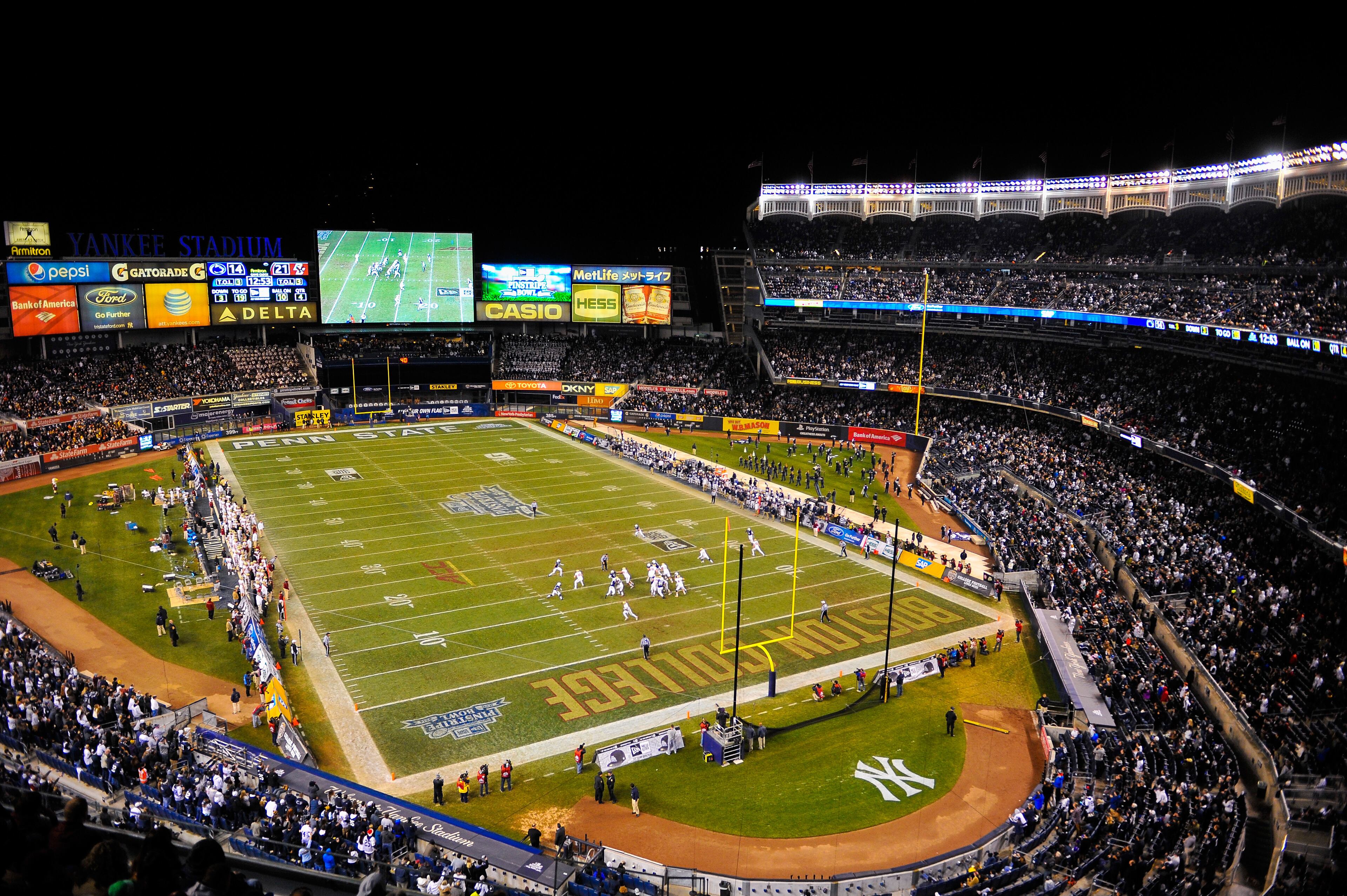 NEW YORK, NY - DECEMBER 27: The Boston College Eagles and Penn State Nittany Lions compete in the 2014 New Era Pinstripe Bowl at Yankee Stadium on December 27, 2014 in the Bronx borough of New York City. (Photo by Alex Goodlett/Getty Images)