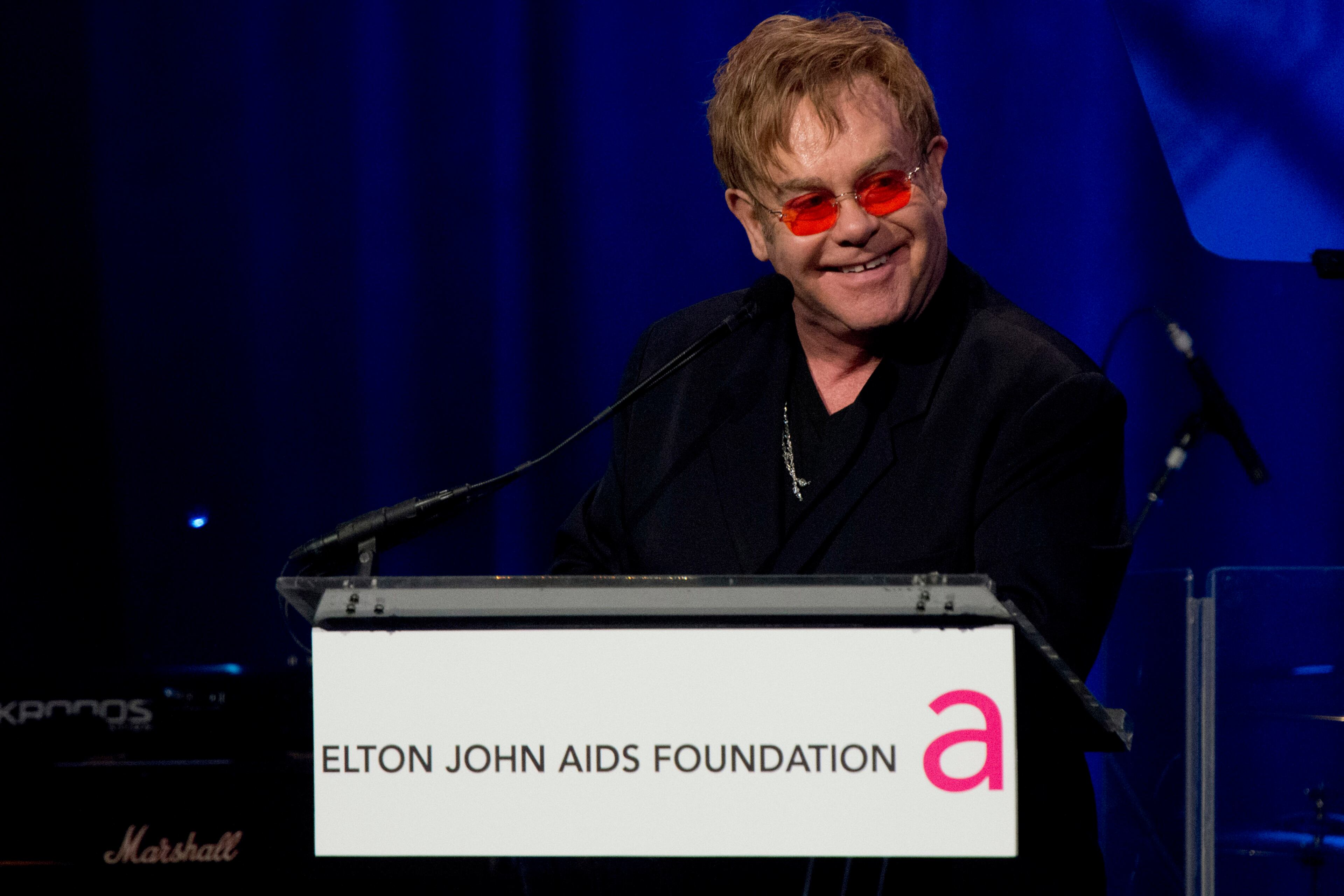 Elton John appears on stage at his AIDS Foundation's 11th annual Enduring Vision benefit on Monday, Oct. 15, 2012 in New York.