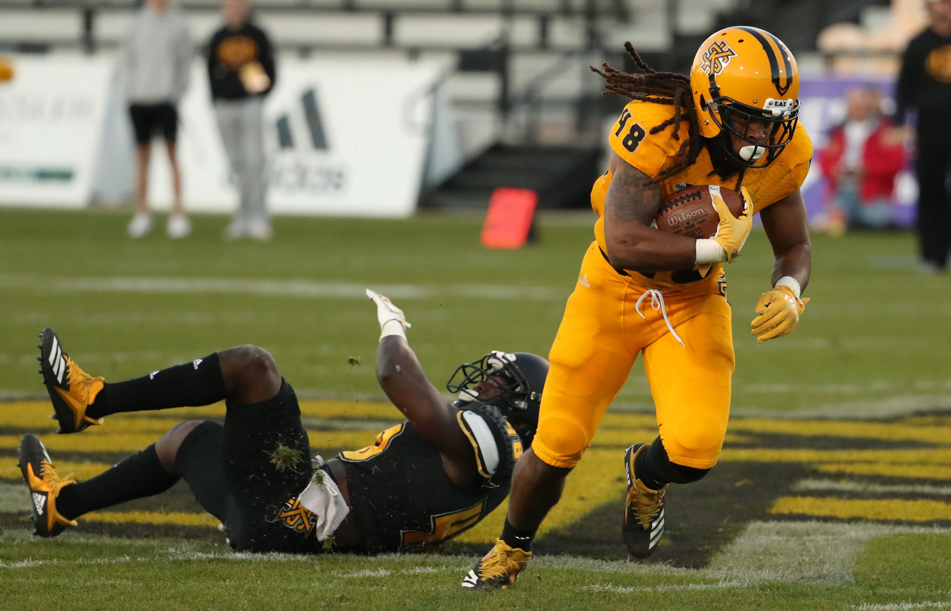 March 22, 2019 - Kennesaw, Ga: Kennesaw State Owls running back Kyle Glover (48) runs after a catch during the KSU spring football game at Fifth Third Bank Stadium Friday, March 22, 2019 in Kennesaw, Ga.. (JASON GETZ/SPECIAL TO THE AJC)