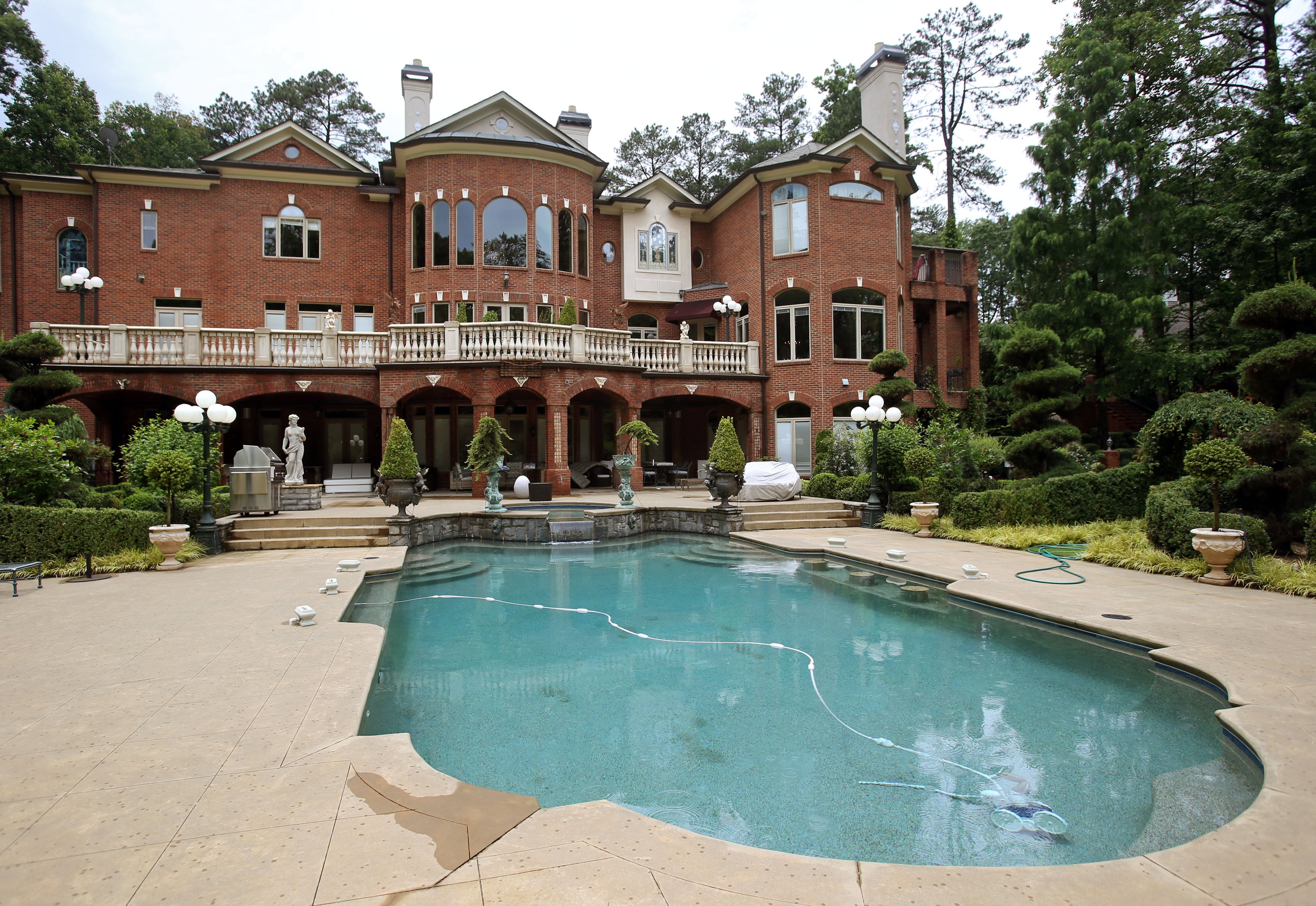 The swimming pool and back view of the home of Scott and Livia Hostetler.