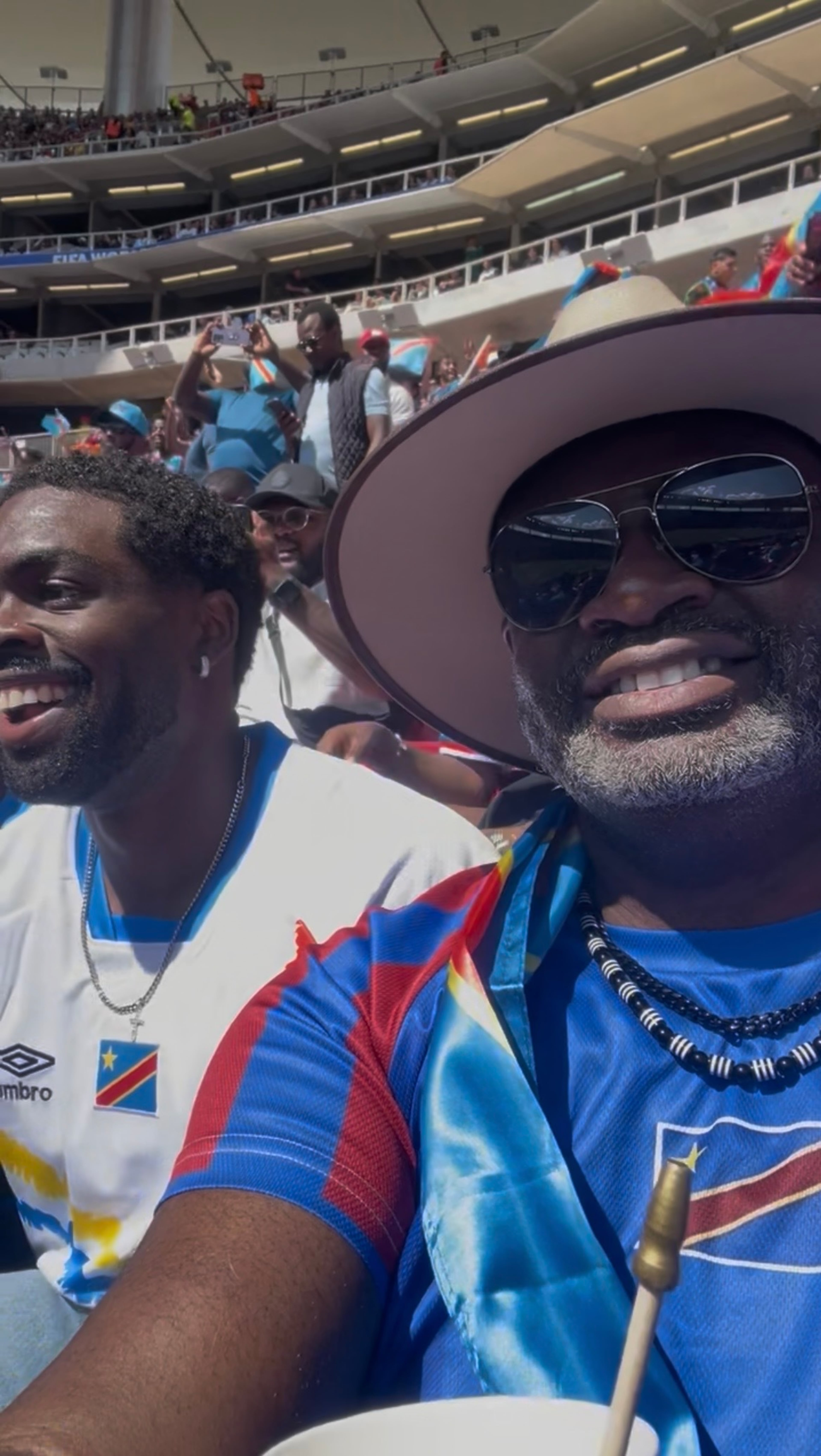 Pambu Claude Mwanda (right) and his son, Daniel, attended DR Congo's qualifying match against Jamaica in Mexico. (Courtesy of Pambu Claude Mwanda)