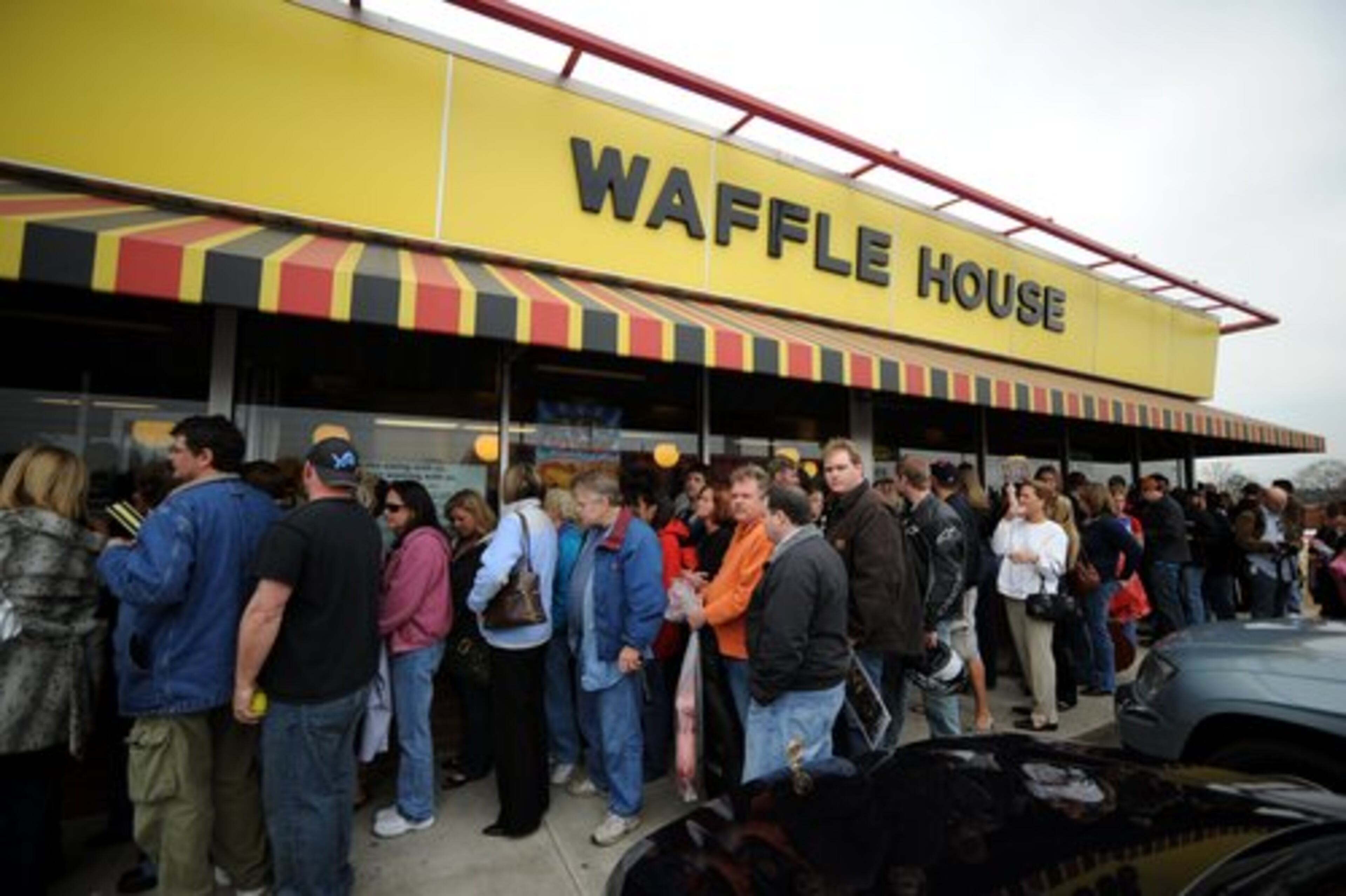 Fans line up to see Kid Rock at the Duluth Waffle House. The musician arrived at 2 p.m. on Tuesday, hours before his concert at Gwinnett Arena.