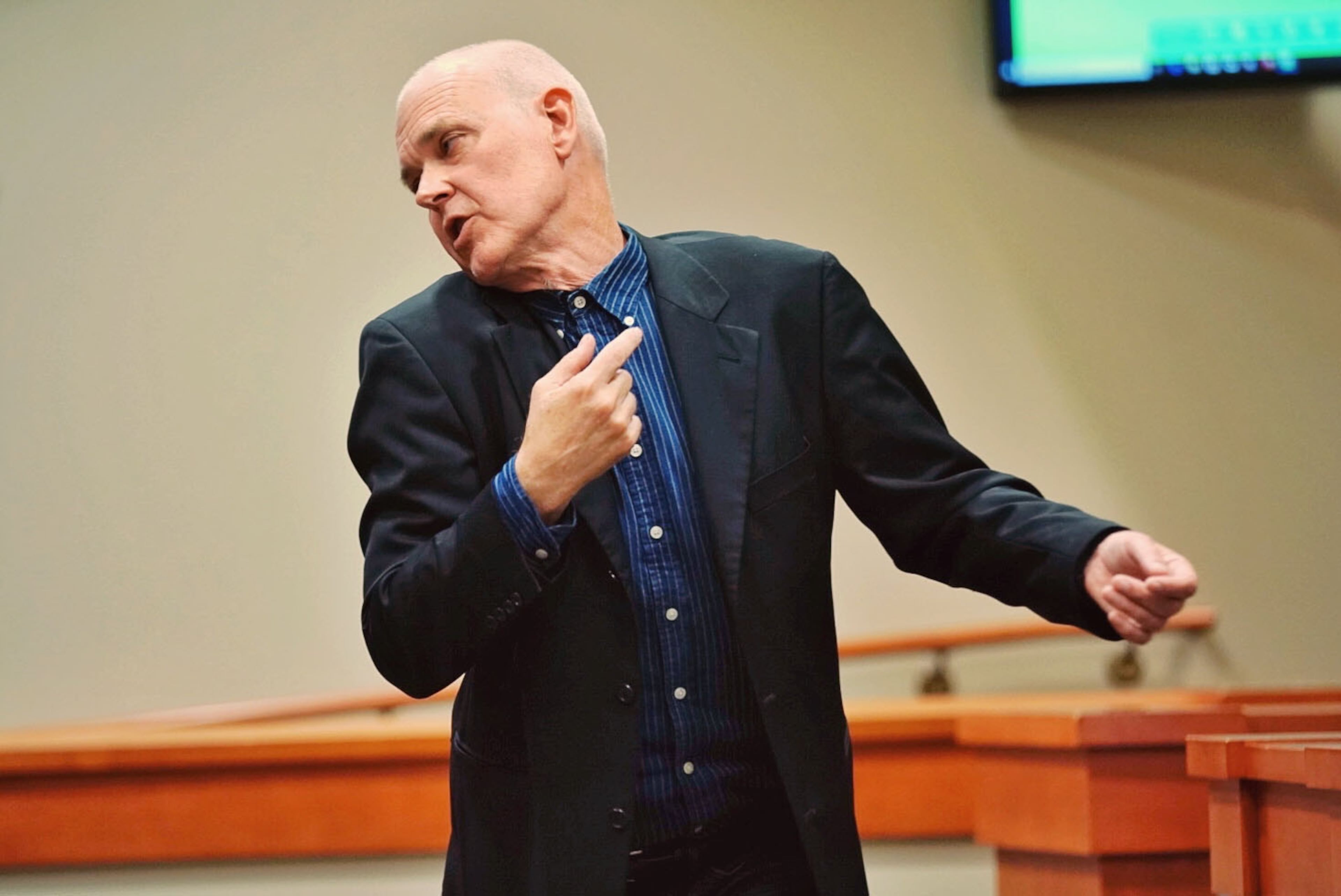 Dr. Geoffrey Smith, deputy chief medical examiner at the Dekalb County Medical Examiner' office, testifies during day three of the Robert Olson murder trial at the DeKalb County Courthouse on October 1, 2019 in Decatur. Olsen is charged with murdering war veteran Anthony Hill. (Elijah Nouvelage for The Atlanta Journal Constitution)