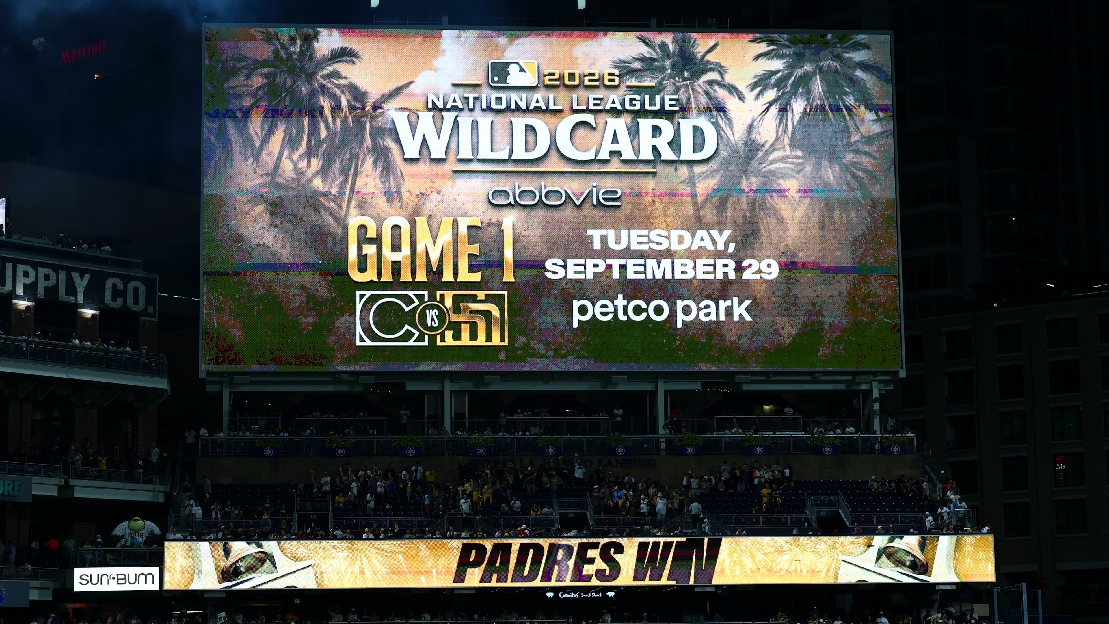 The score board at Petco Park showing the San Diego Padres will host the Chicago Cubs on Sept. 29 for the National League Wild Card series Saturday, Sept. 26, 2026, in San Diego. (AP Photo/Karl Anderson)