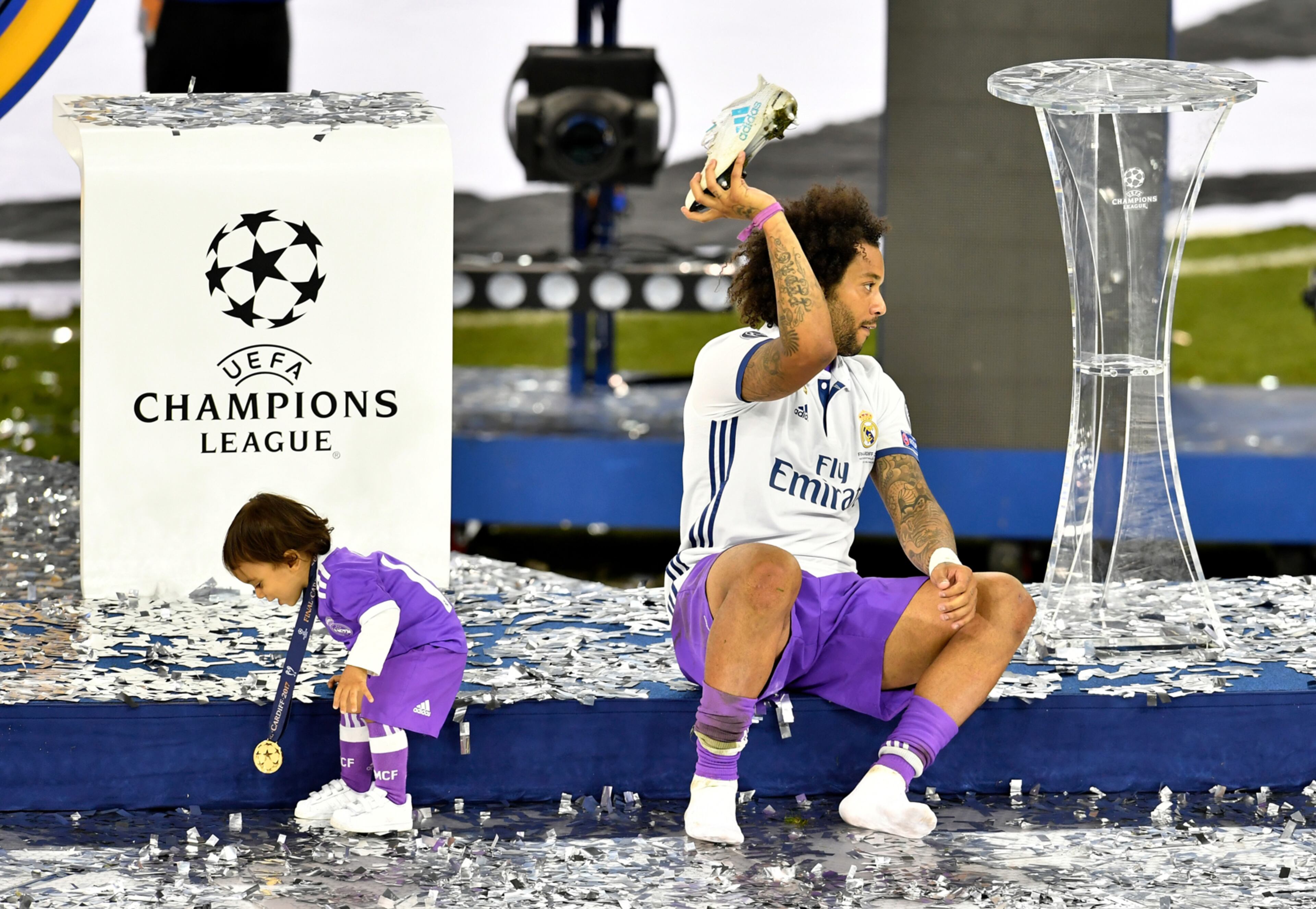 CARDIFF, WALES - JUNE 03: In this handout image provided by UEFA, Marcelo of Real Madrid celebrates with children after the UEFA Champions League Final between Juventus and Real Madrid at National Stadium of Wales on June 3, 2017 in Cardiff, Wales. (Photo by Handout/UEFA via Getty Images)