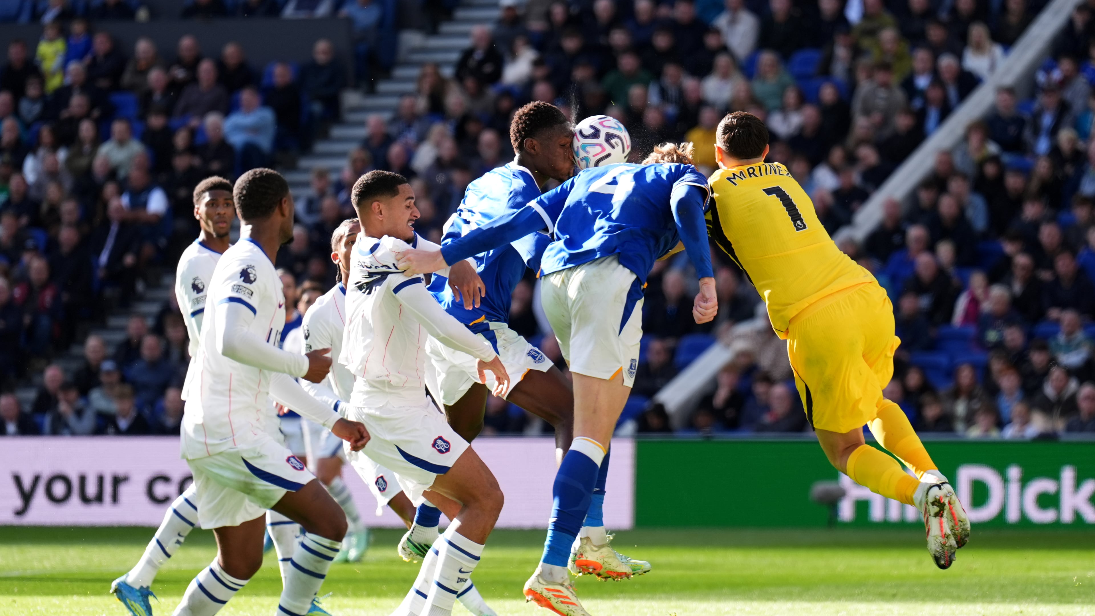 Chelsea goalkeeper Emiliano Martinez, right, picks up an injury during the English Premier League soccer match between Everton and Chelsea in Liverpool, England, Saturday, Oct. 17, 2026. (Mike Egerton/PA via AP)