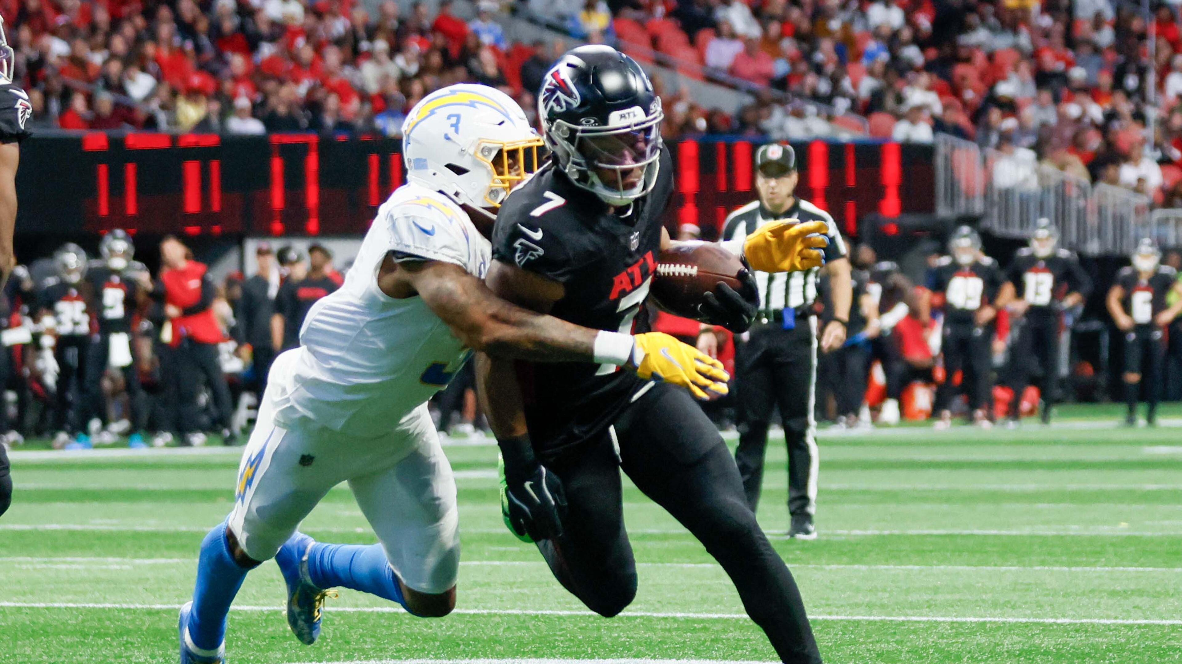 Atlanta Falcons running back Bijan Robinson (7) runs for yards during the first half of an NFL football game against the Los Angeles Chargers on Sunday, Dec. 1, 2024, at Mercedes-Benz Stadium in Atlanta. (Miguel Martinez/AJC)