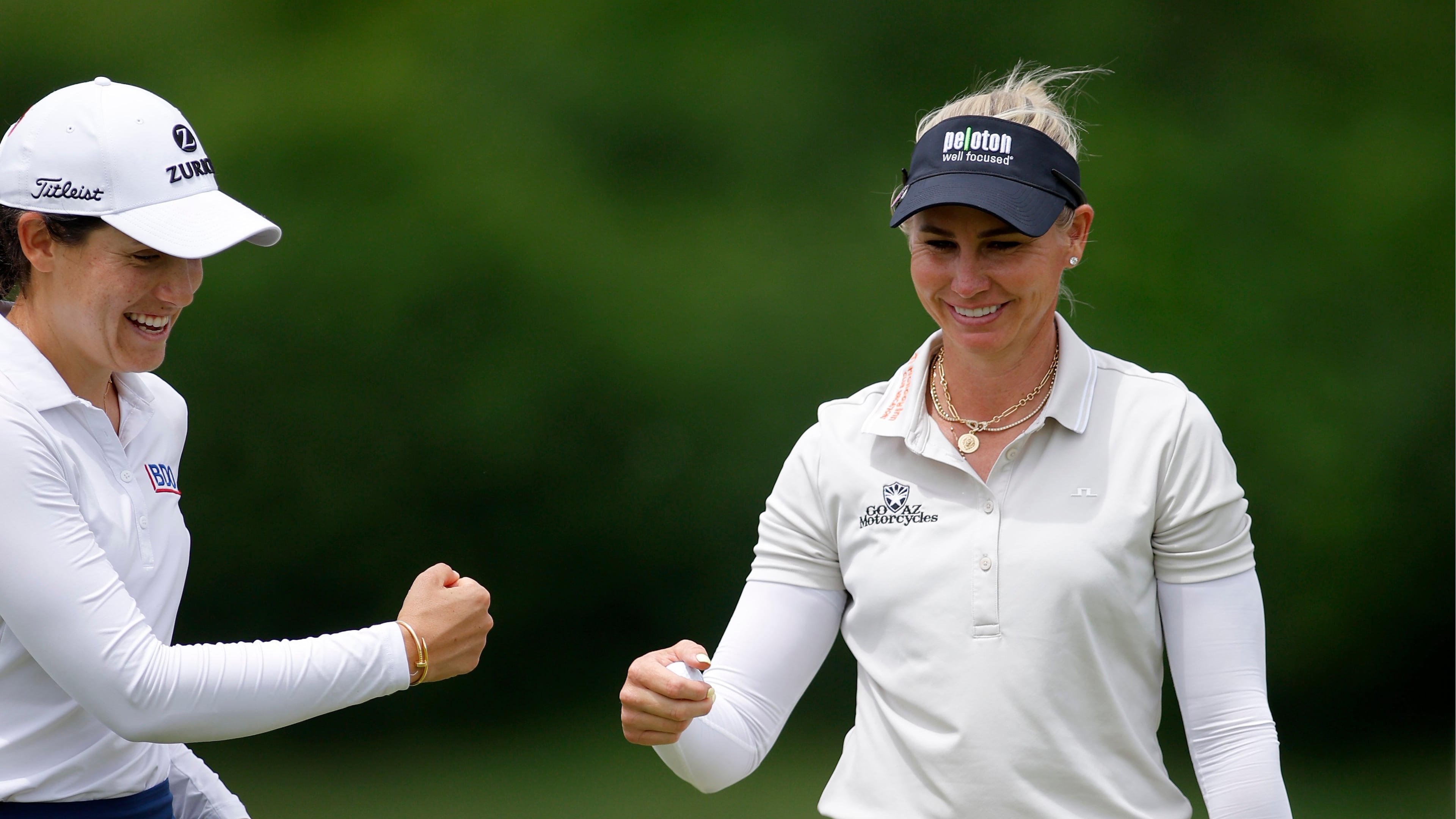 Ryann O'Toole, right, and Albane Valenzuela, left, celebrate on the 16th green during the first round of the Dow Championship LPGA golf tournament, Thursday, June 11, 2026, at Midland Country Club in Midland, Mich. (AP Photo/Al Goldis)