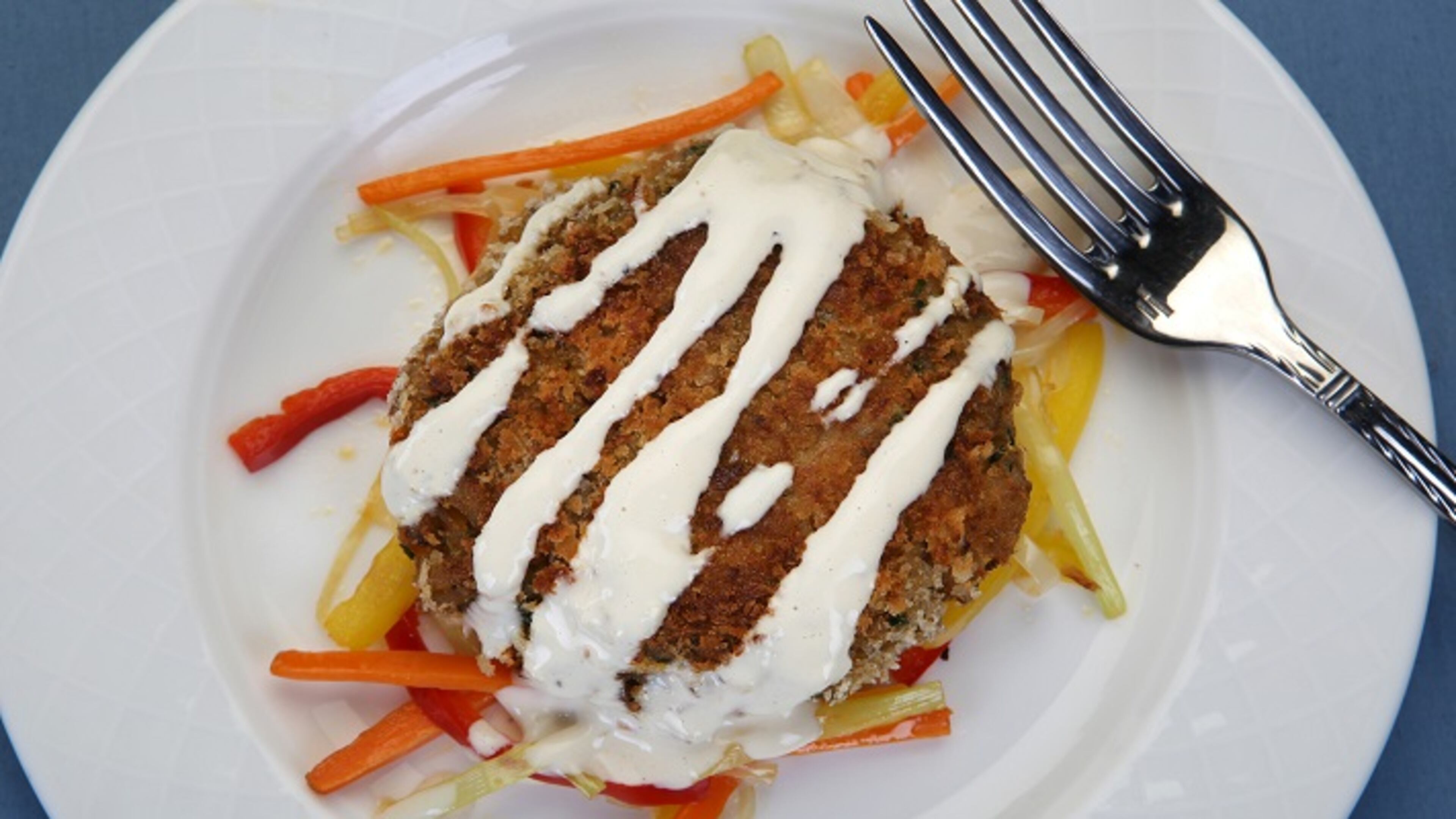 Crab cake from the Watercolour Grill at the Clearwater Beach Marriott Suites on Sand Key was photographed at the Los Angeles Times studio on September 13, 2017. (Glenn Koenig/Los Angeles Times/TNS)