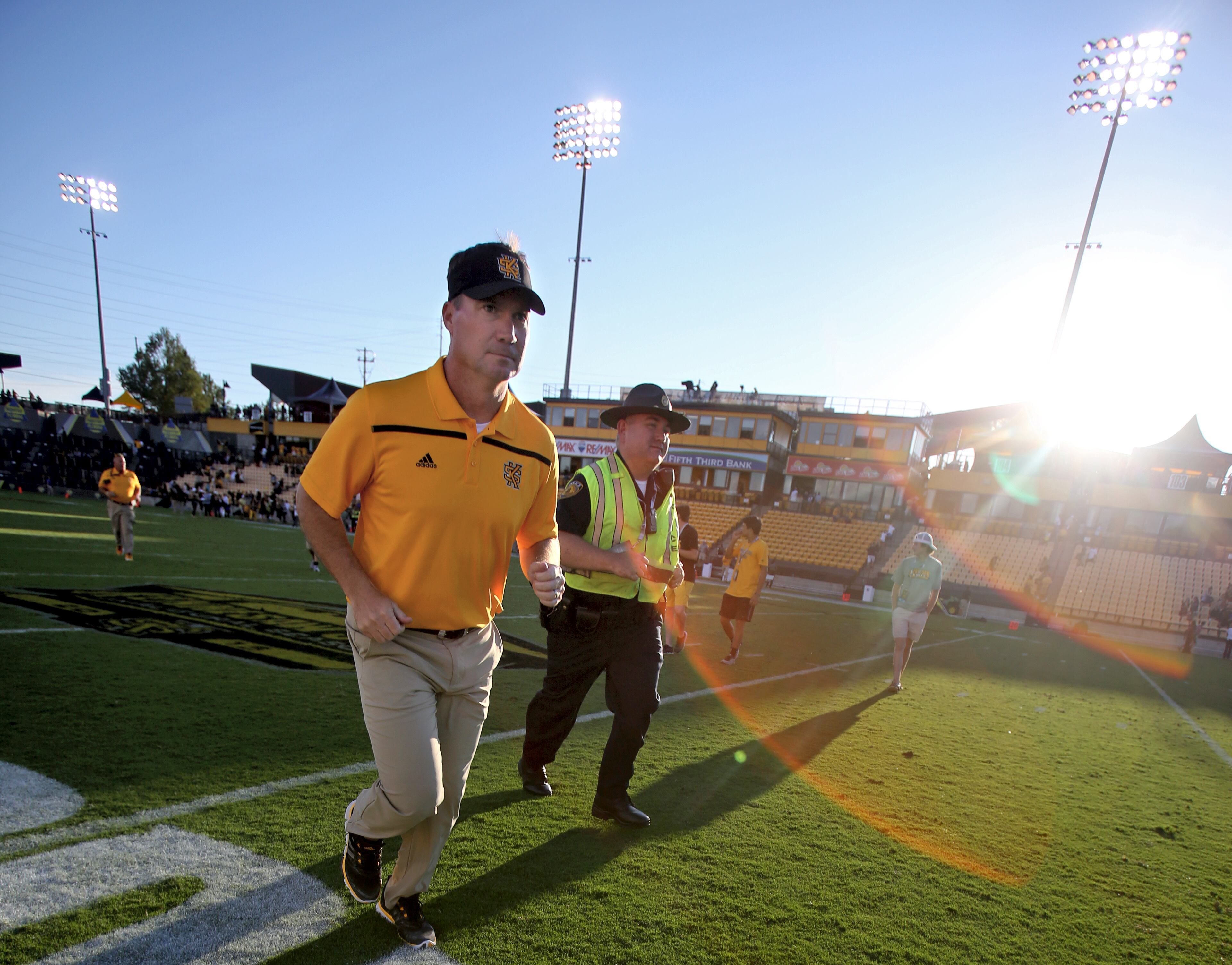September 12, 2015 - Kennesaw, Ga: Kennesaw State University head coach Brian Bohannon runs off of the field after their game against Edward Waters at Fifth Third Bank Stadium, Saturday, September 12, 2015, in Kennesaw, Ga.. KSU won 58-7. This is the first home game of KSU's inaugural football season. PHOTO / JASON GETZ