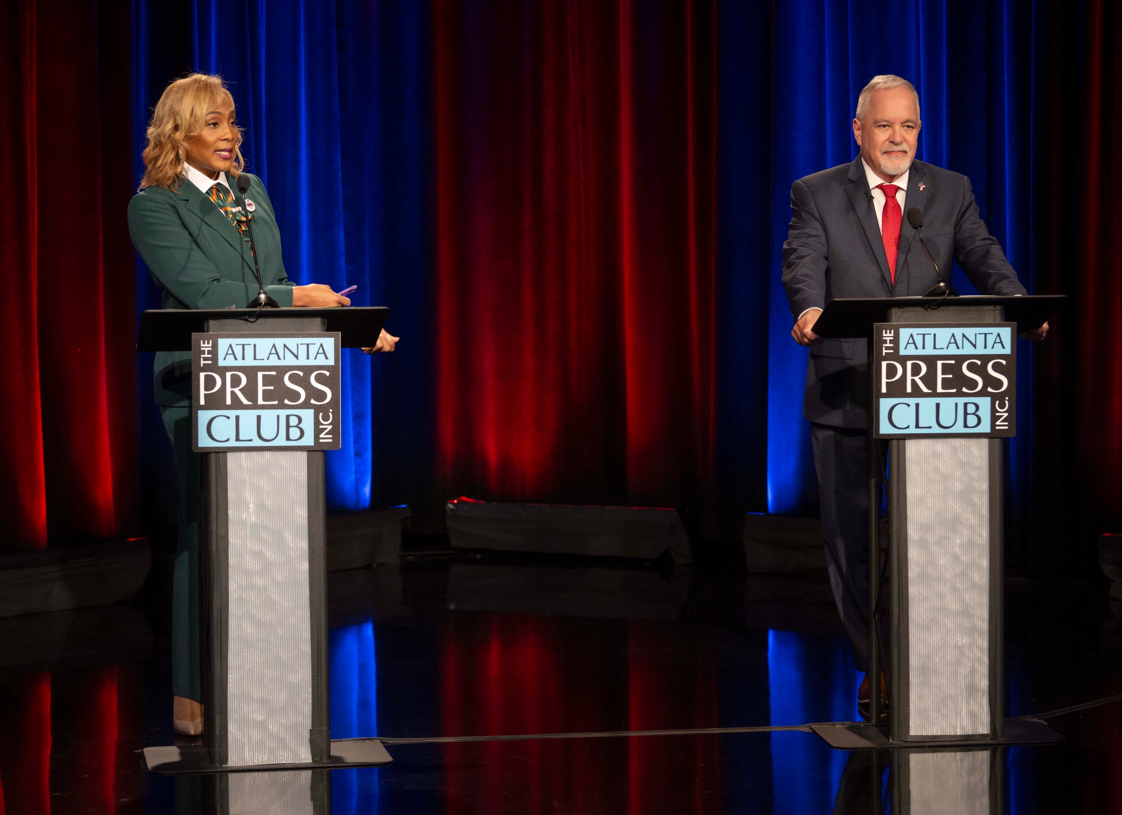 Incumbent School Superindendent Richard Woods debates Democratic candidate Lydia Powell at the Atlanta Press Club's Loudermilk-Young Debate Series held Tuesday, Oct. 13, at the studios of Georgia Public Broadcasting. (Pool photo by Brian Cahn)