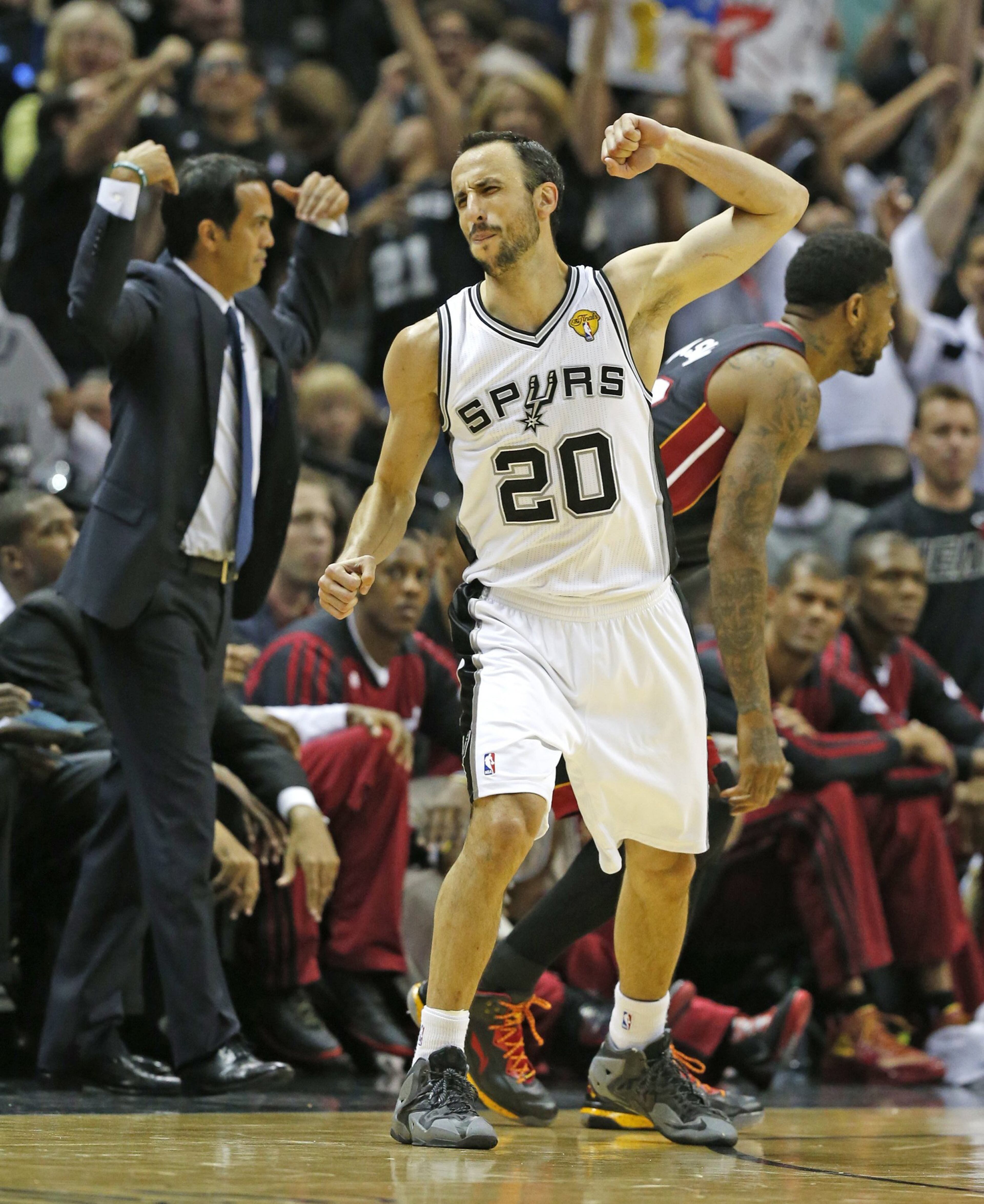 San Antonio Spurs Manu Ginobili celebrates after hitting a three pointer in the third quarter in Game 5 of the NBA Finals at the AT&T Center in San Antonio, Texas, on Sunday, June 15, 2014. (Al Diaz/Miami Herald/MCT)